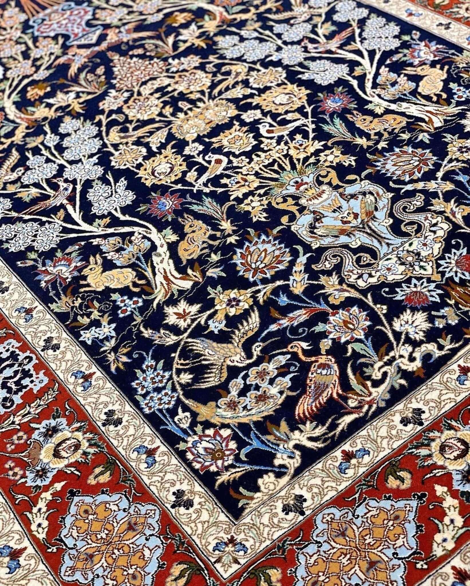 Handmade Persian rug for sale, crafted in Isfahan with floral and bird motifs
