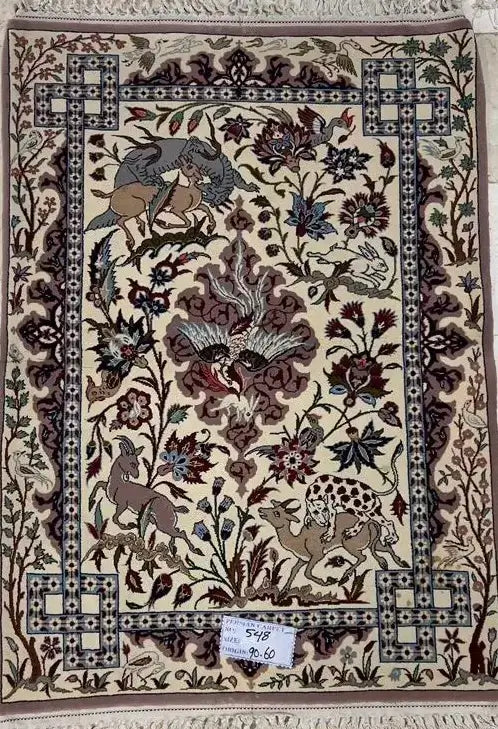 "Isfahan Persian wool and silk rug, 90x60 cm, hand-knotted with 1,000,000 knots/m², bringing vintage charm and cultural richness to your decor."

