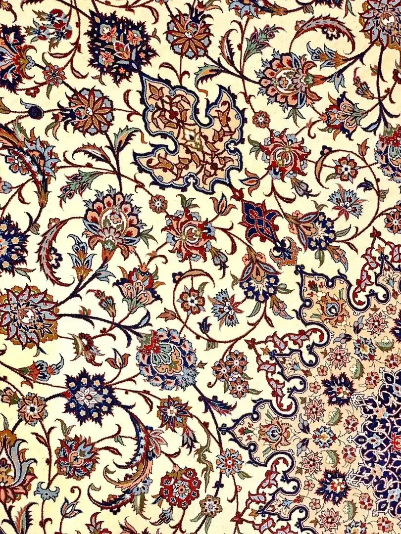 Traditional Isfahan carpet with intricate medallion design, crafted by Zojaji in Iran, ideal for adding a touch of elegance to your home.

