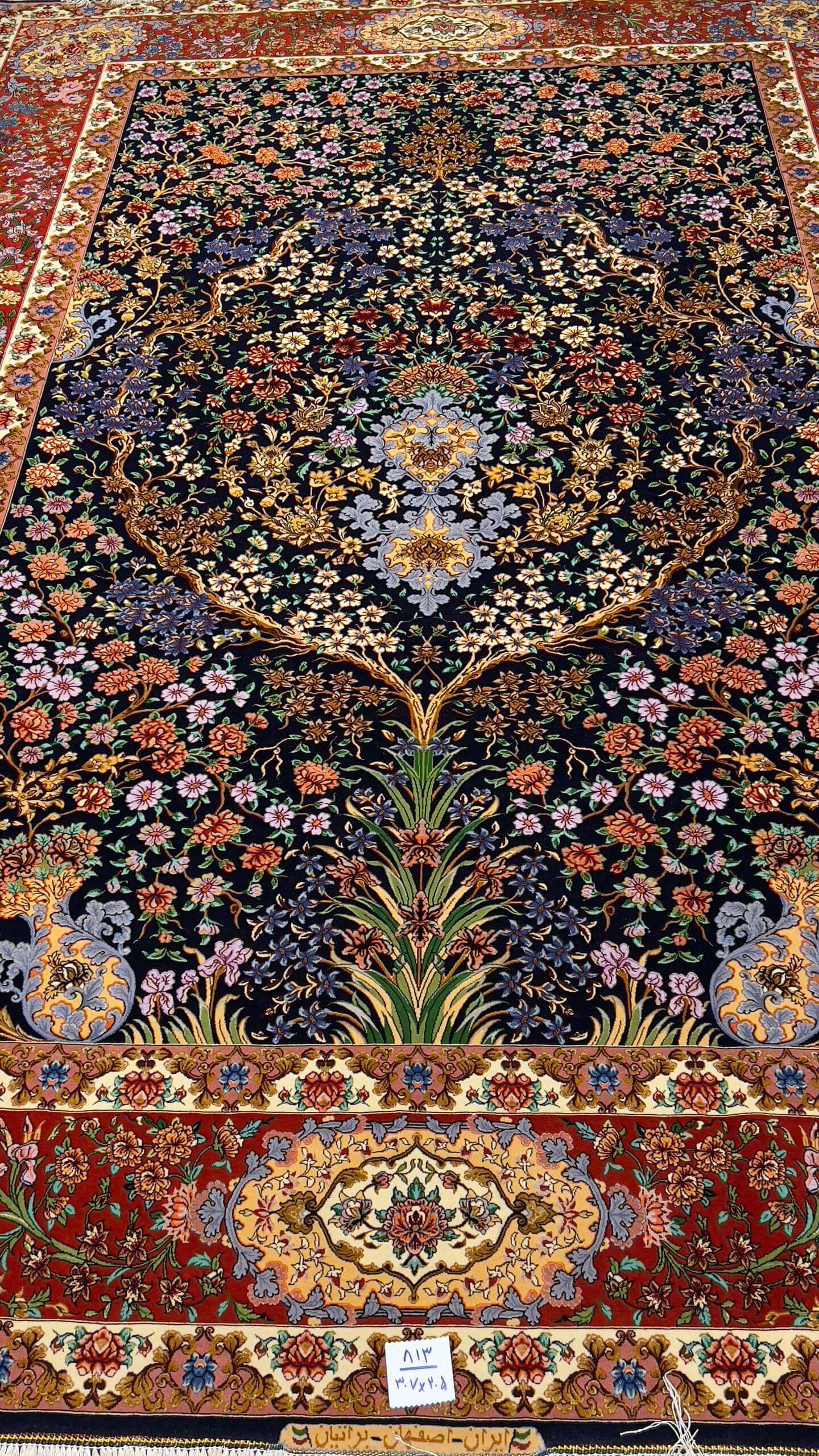 Persian Isfahan Bartarian rug showcasing traditional Tree of Life floral patterns