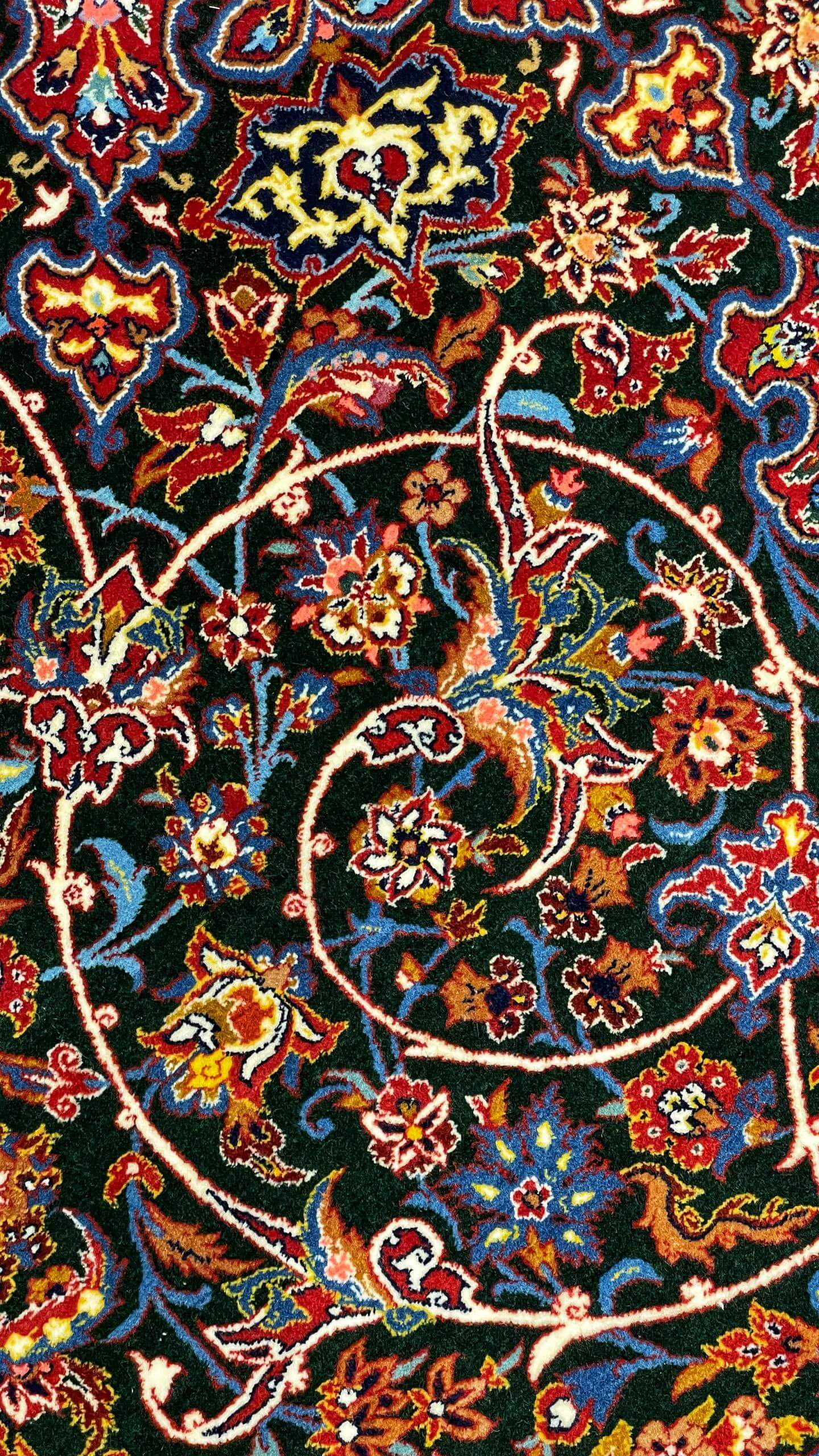 "Close-up of intricate knotwork on Seirafian carpet by Late Master Ahmad Seirafian."
