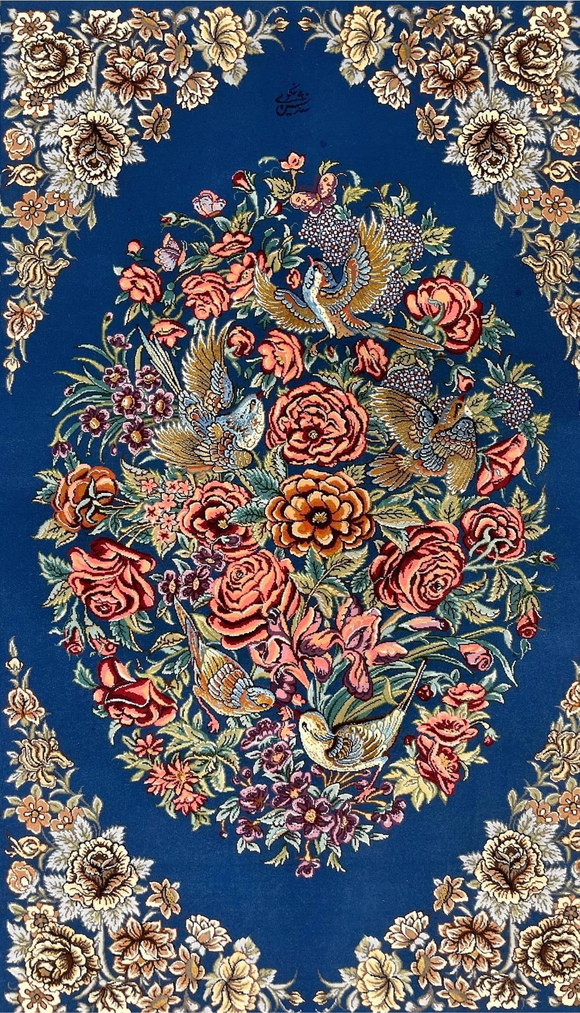 "Luxury Persian carpet with intricate floral and bird motifs, handwoven with fine wool and silk for durability and elegance."