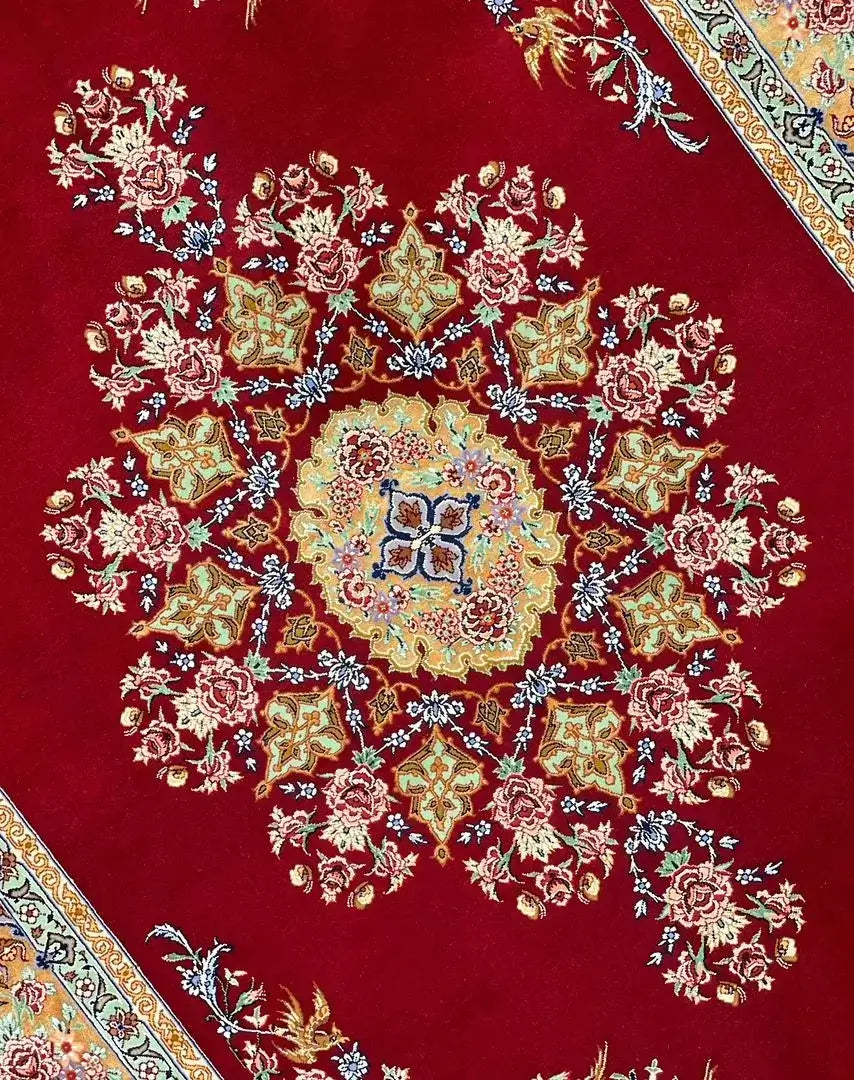 "Elegant Persian Isfahan rug with a rich red background, exquisite craftsmanship, and 840,000 knots per m²."