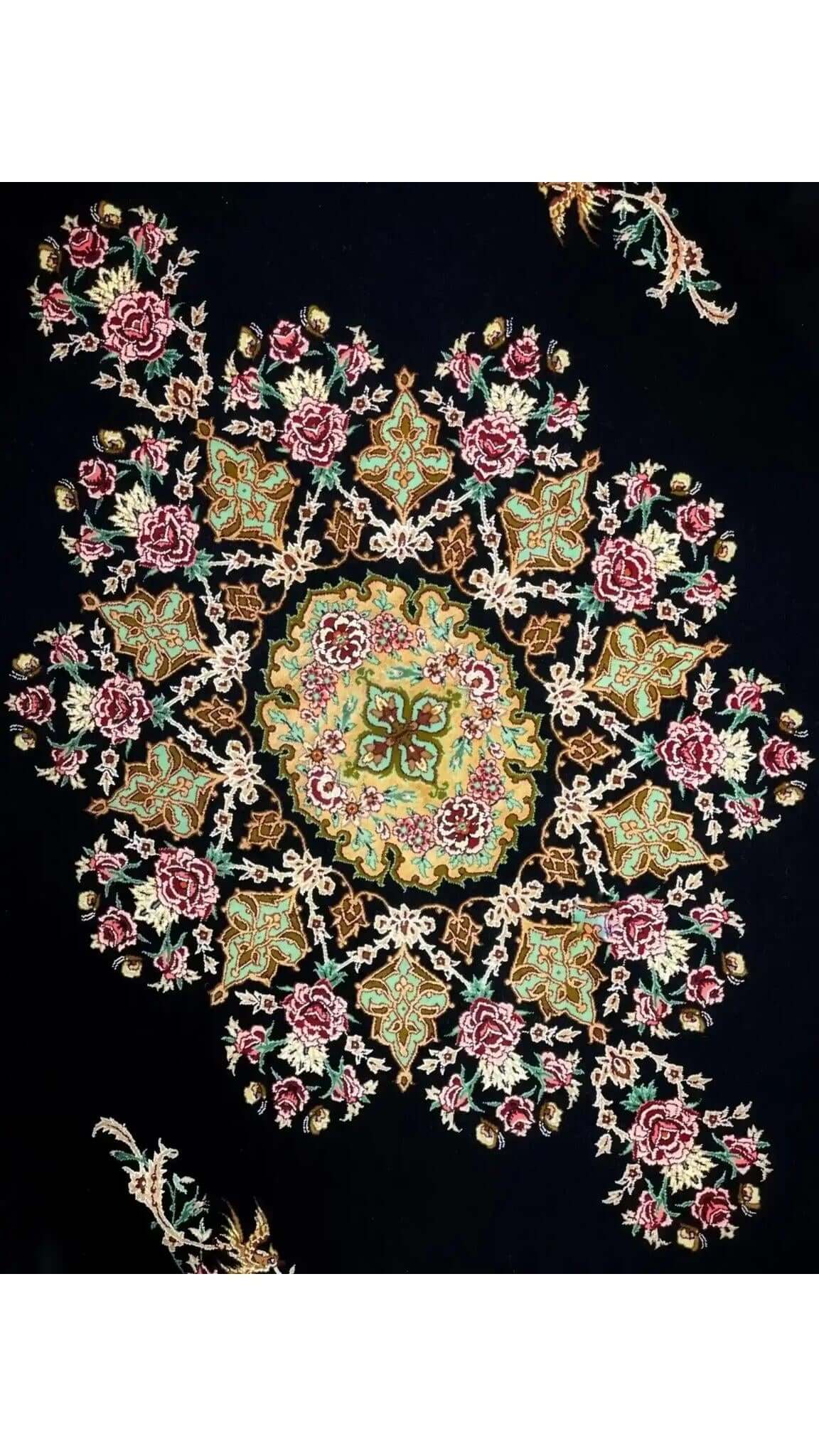 "Close-up of Persian rug featuring central medallion and floral designs."
