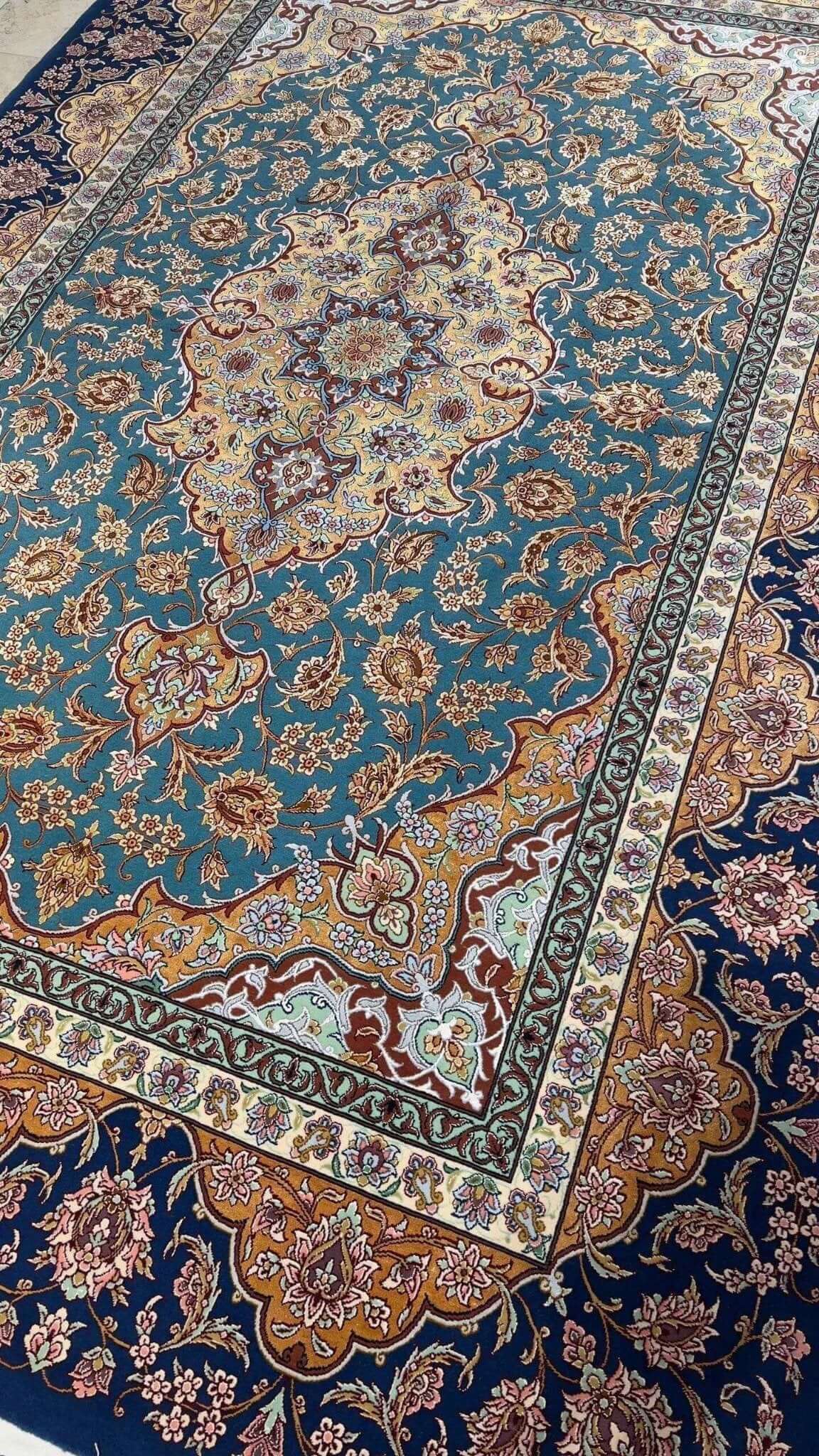 "Luxury large Akhtarian Isfahan rug, 8.2 x 5.6 feet, handcrafted with wool and silk, featuring a knot density of 810,000 knots per m²."
