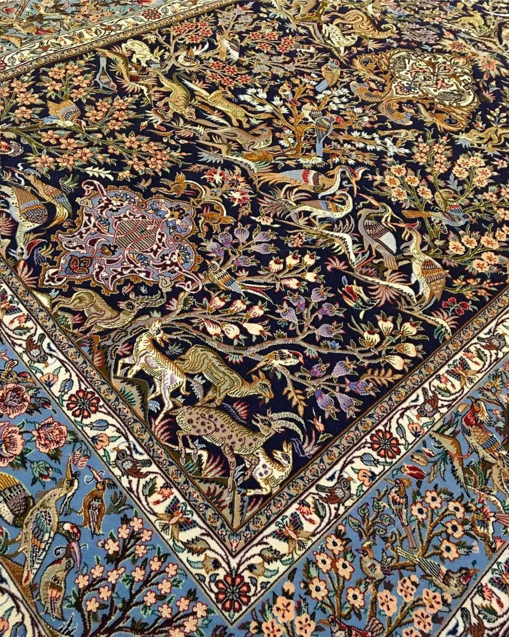 "Luxury Persian carpet from Isfahan, Iran, made of silk and wool with Persian wildlife and floral motifs."