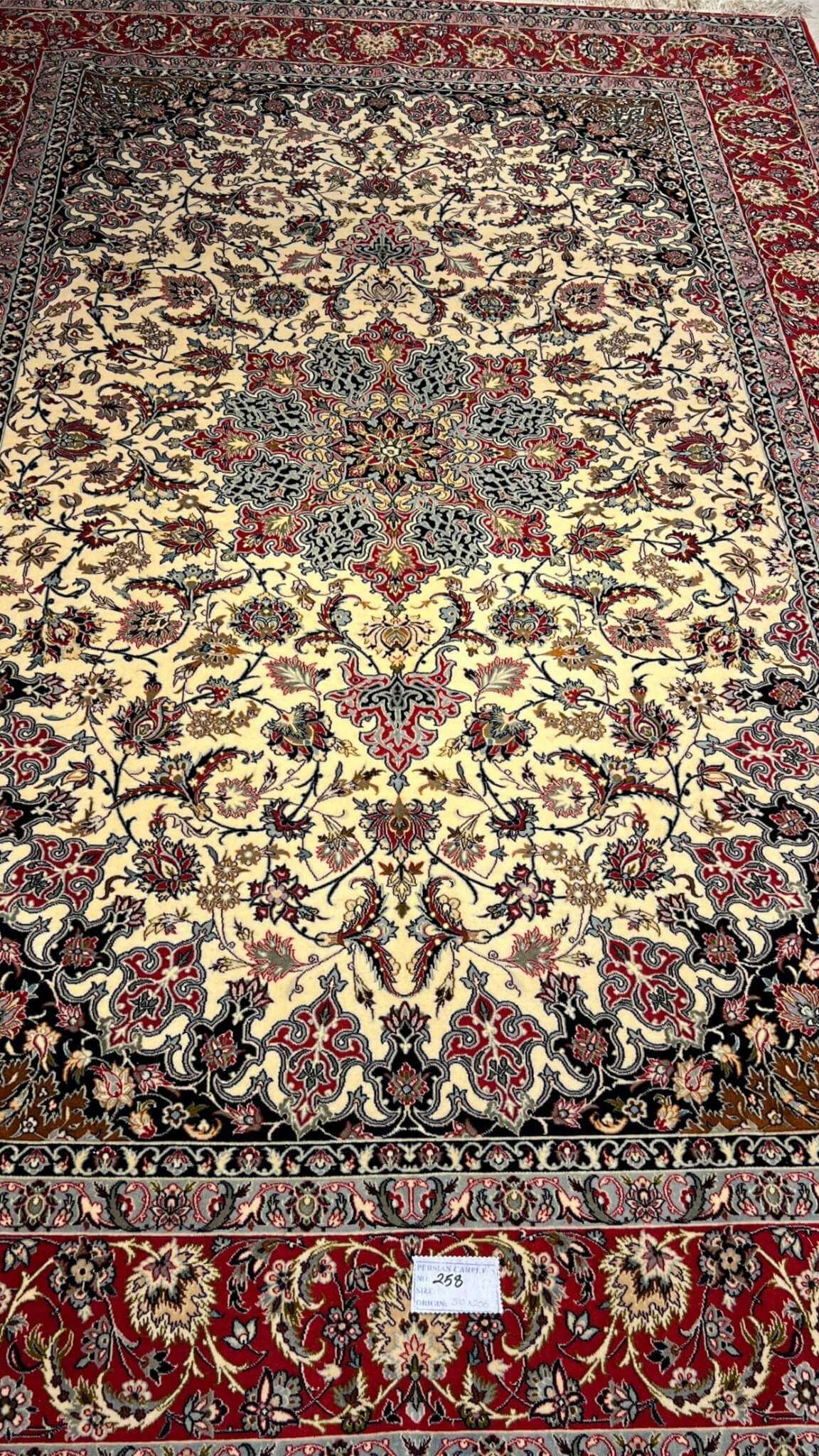 Luxury Isfahan carpet with central medallion pattern.
