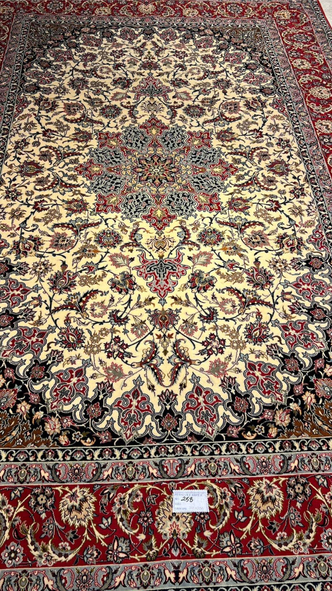 Persian Isfahan rug with Toranj medallion design.
