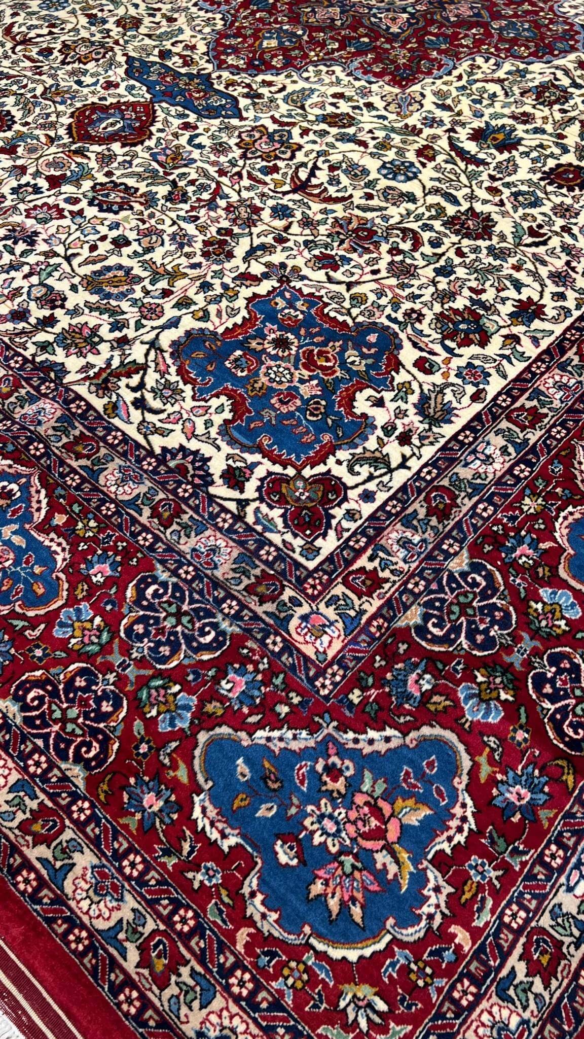 "Vintage Persian rug with Safavid-inspired design and natural colors"
