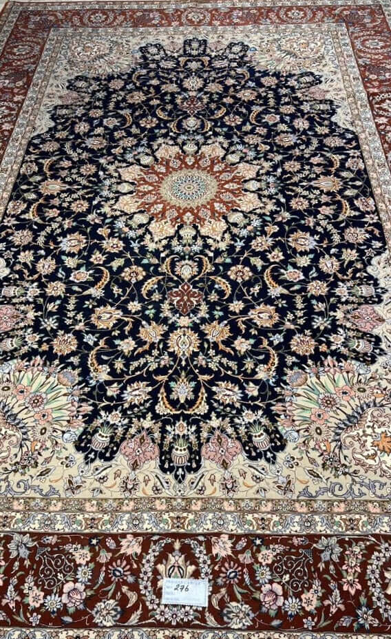 "Premium Persian rug with deep navy, burgundy, and ivory floral patterns, perfect for luxury home decor."
