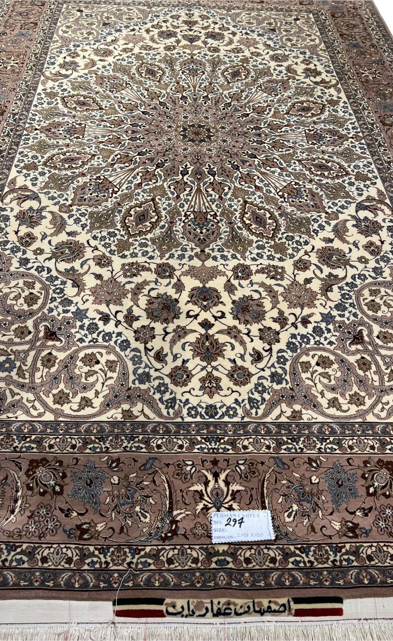 Vintage handwoven Persian carpet in beige and brown tones.
