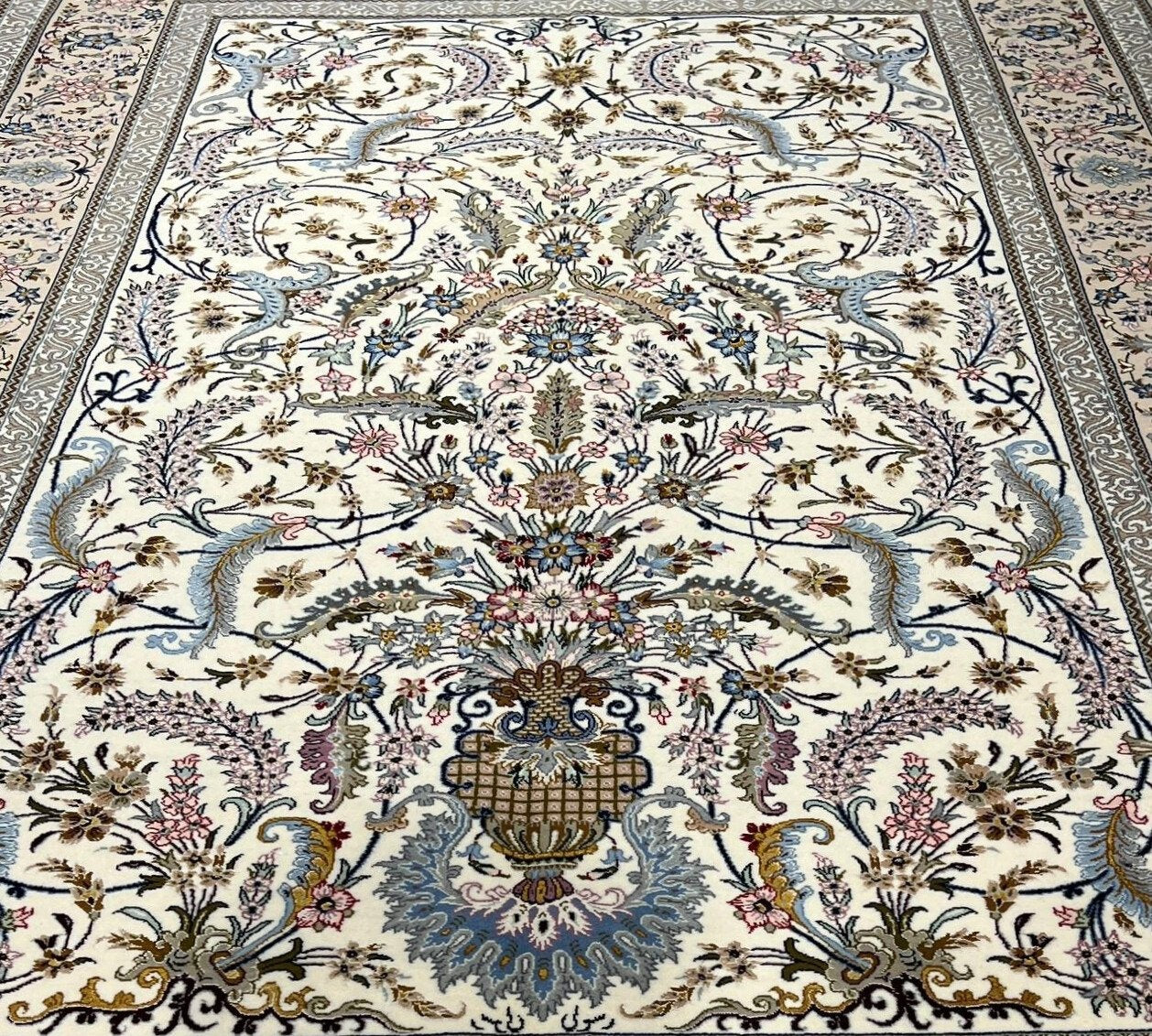 "Full view of the Isfahan rug's elegant design and luxurious silk blend."