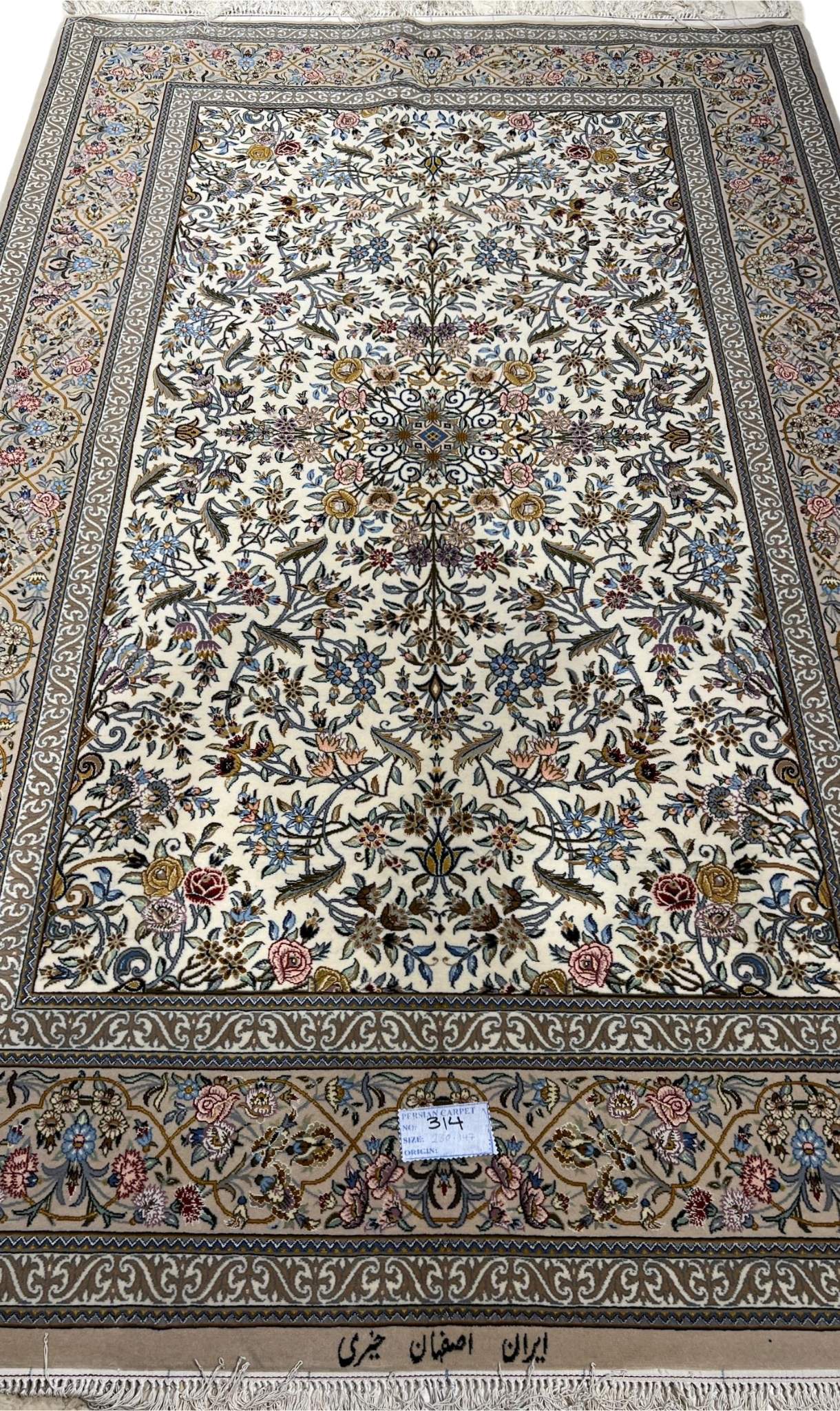 "Full view of the Isfahan rug's elegant design and luxurious silk blend."