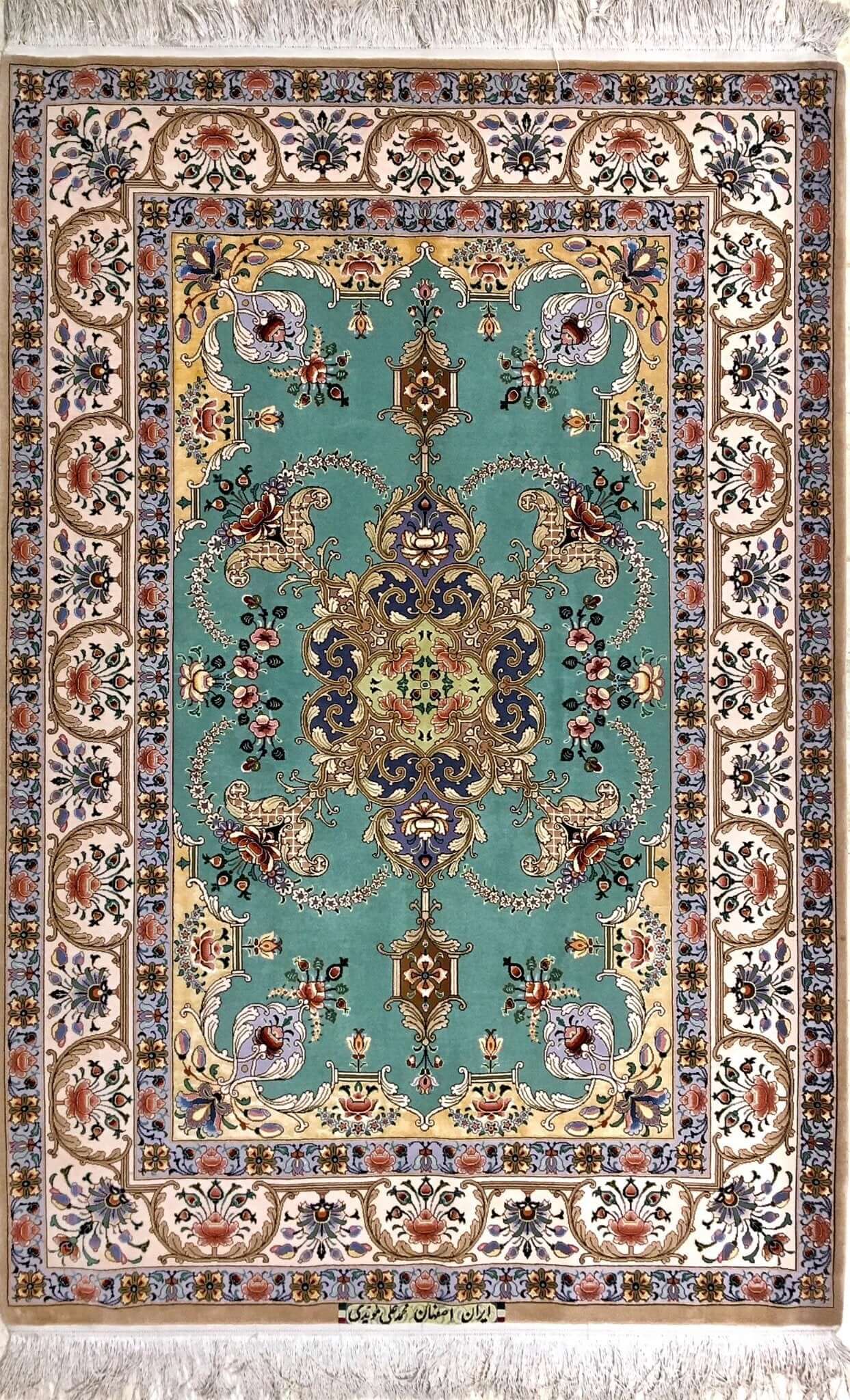 "Hand-knotted Persian Isfahan rug in blue and green, crafted by Master Moaeidie, measuring 172 x 119 cm (approximately 5.6 x 3.9 feet), featuring 1,000,000 knots per square meter, made with wool and silk in Isfahan, Iran."

