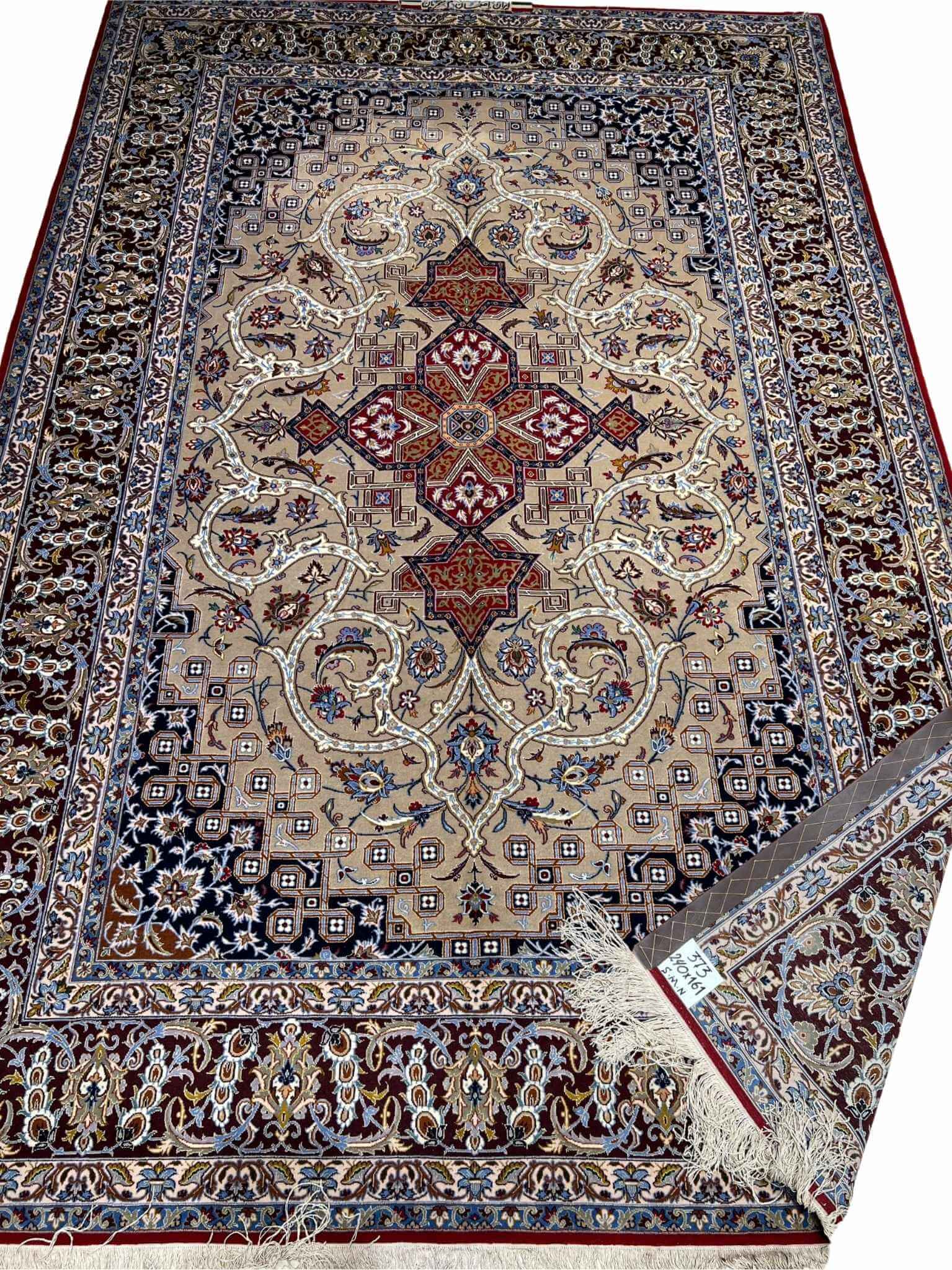 Handwoven Persian rug in beige, burgundy, and navy tones.
