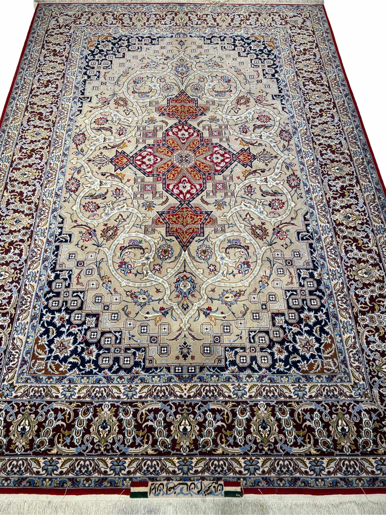 Authentic Persian rug with medallion design and rich colors.
