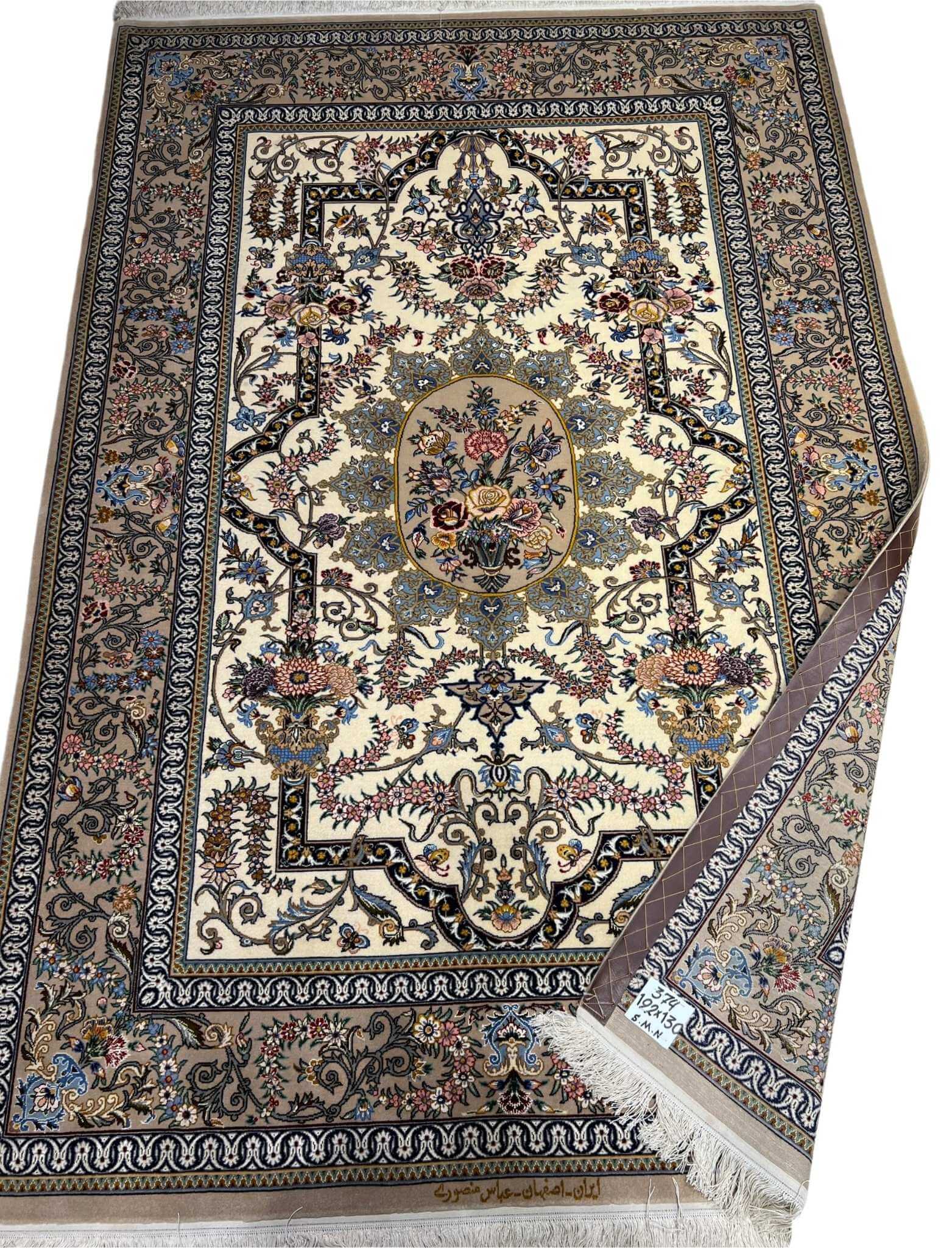 "Elegant Persian wool and silk rug featuring detailed floral patterns, perfect for upscale interiors."
