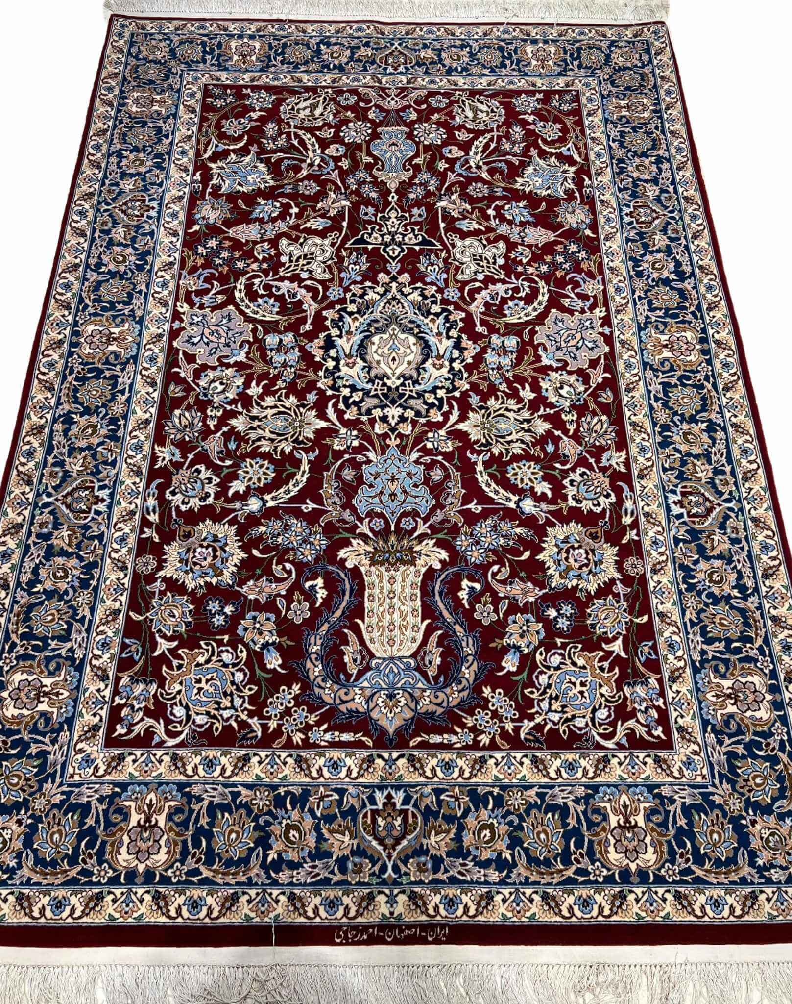 Elegant dark red Persian carpet with traditional motifs available