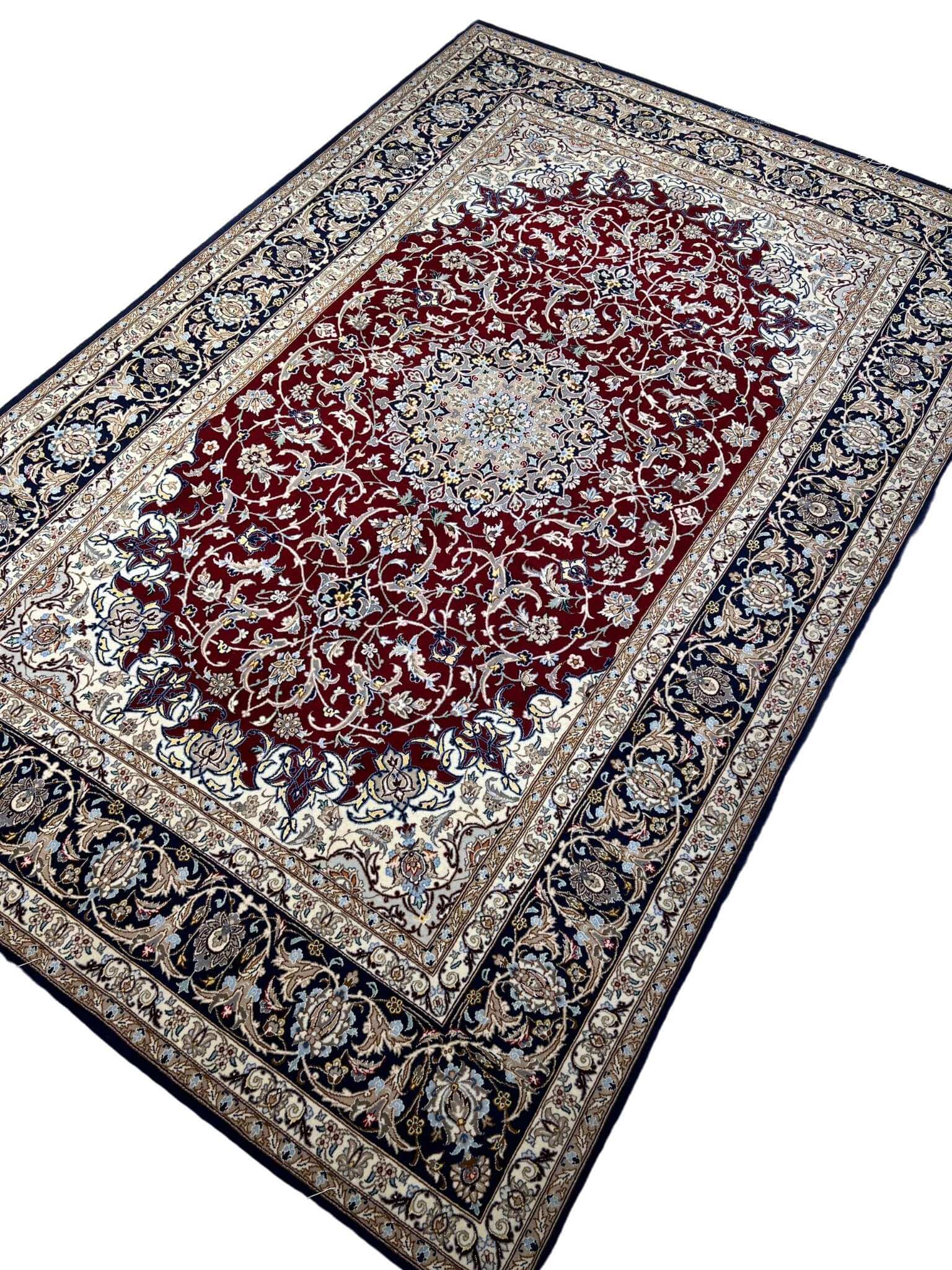 Traditional Persian medallion rug with intricate details.
