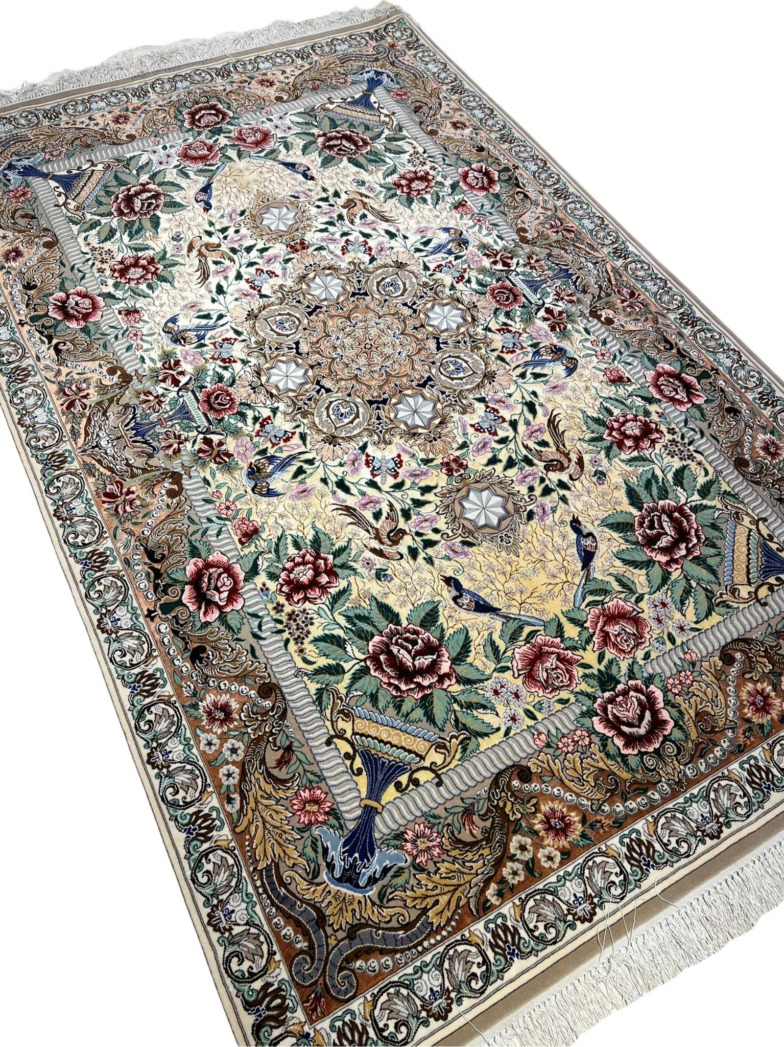 Traditional Isfahan carpet featuring Ghajar designs.
