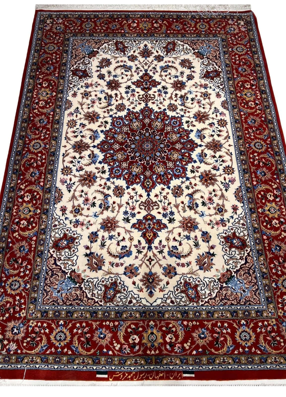 "Hand-knotted Isfahan rug with red floral medallion design, 6.1x4.3 ft."
