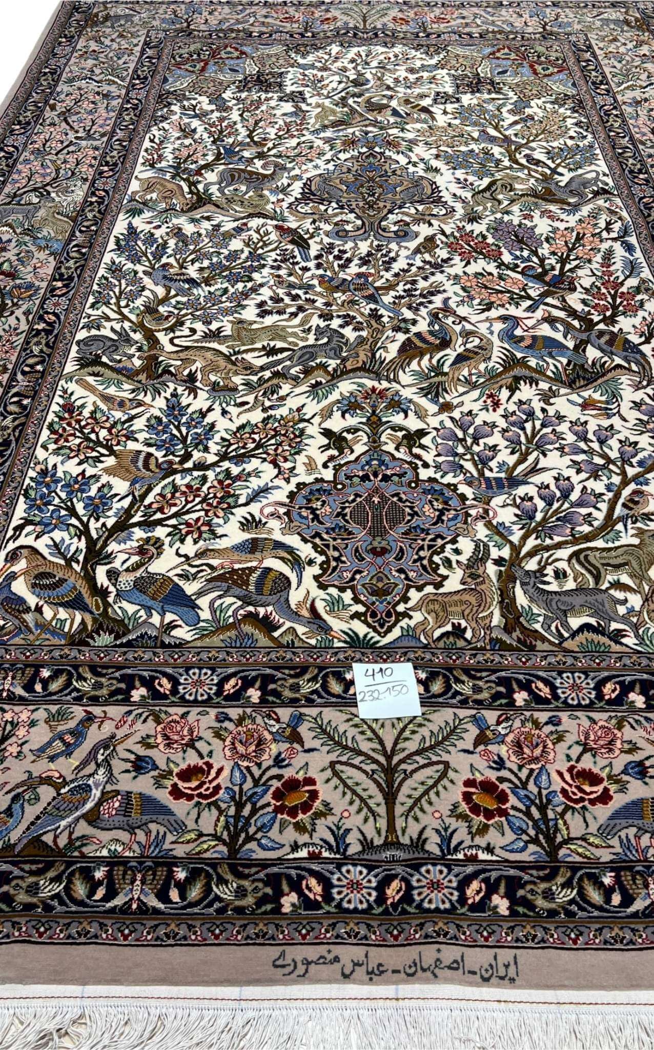 "Elegant Isfahan hunting design rug by Mansourie, crafted with 810,000 knots per m² for superior quality and durability."