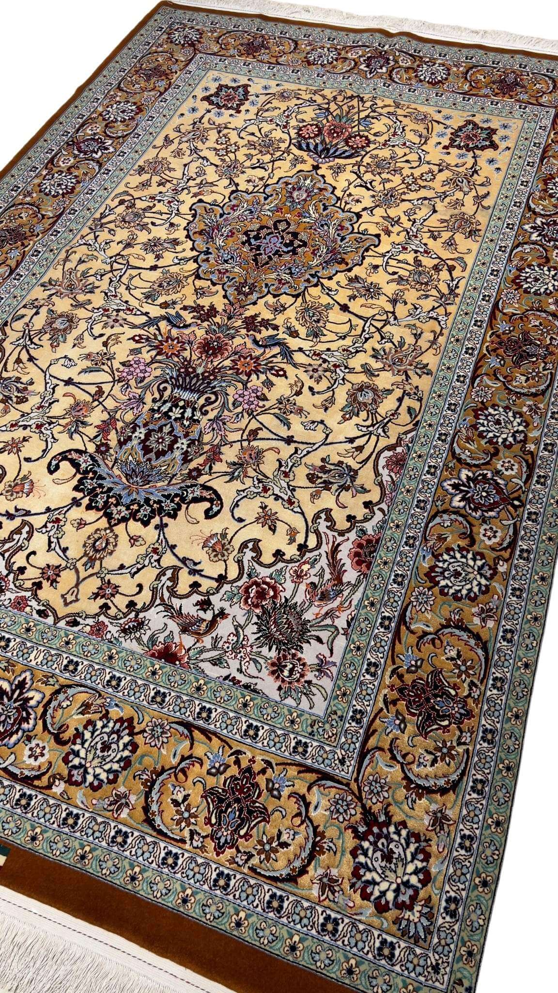 "Luxury handmade Persian rug from Isfahan, showcasing a vibrant traditional design in wool and silk, measuring 230 cm x 150 cm, perfect for elegant home decor."