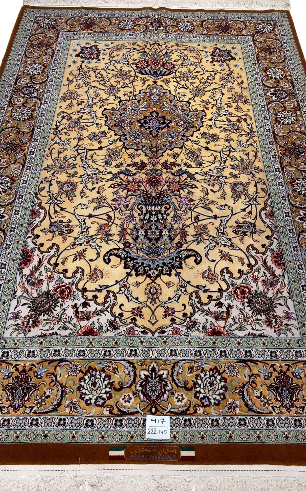 Exquisite Persian Isfahan rug, hand-knotted by Dehghan, featuring intricate floral patterns in wool and silk, with a size of 230 cm x 150 cm and a high knot density of 910,000 knots per square meter."