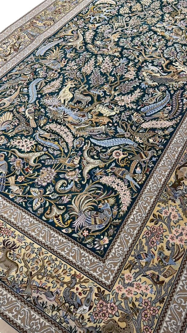 "Authentic Persian hunting rug with intricate deer and bird motifs, handcrafted in Iran’s Isfahan region."