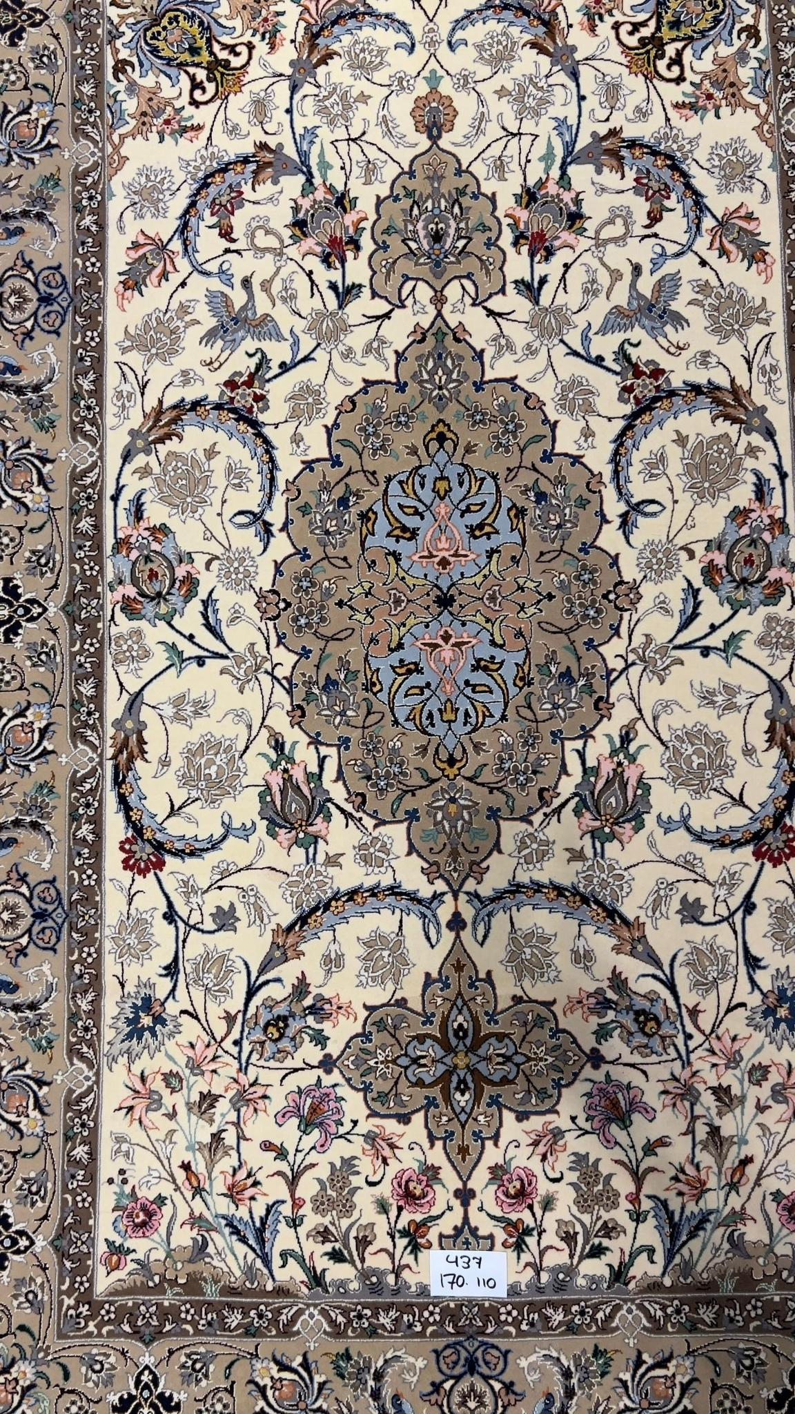 ersian wool and silk rug from Isfahan with beige and blue tones