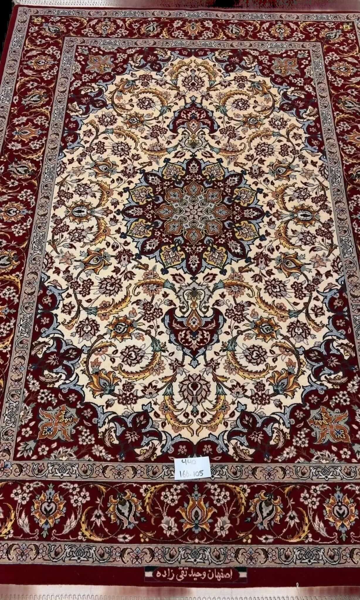 "Shop high-quality Isfahan Persian rug online, crafted with wool and silk. Ideal for living room decor, this 5.4x3.4 feet area rug offers elegance and durability."

