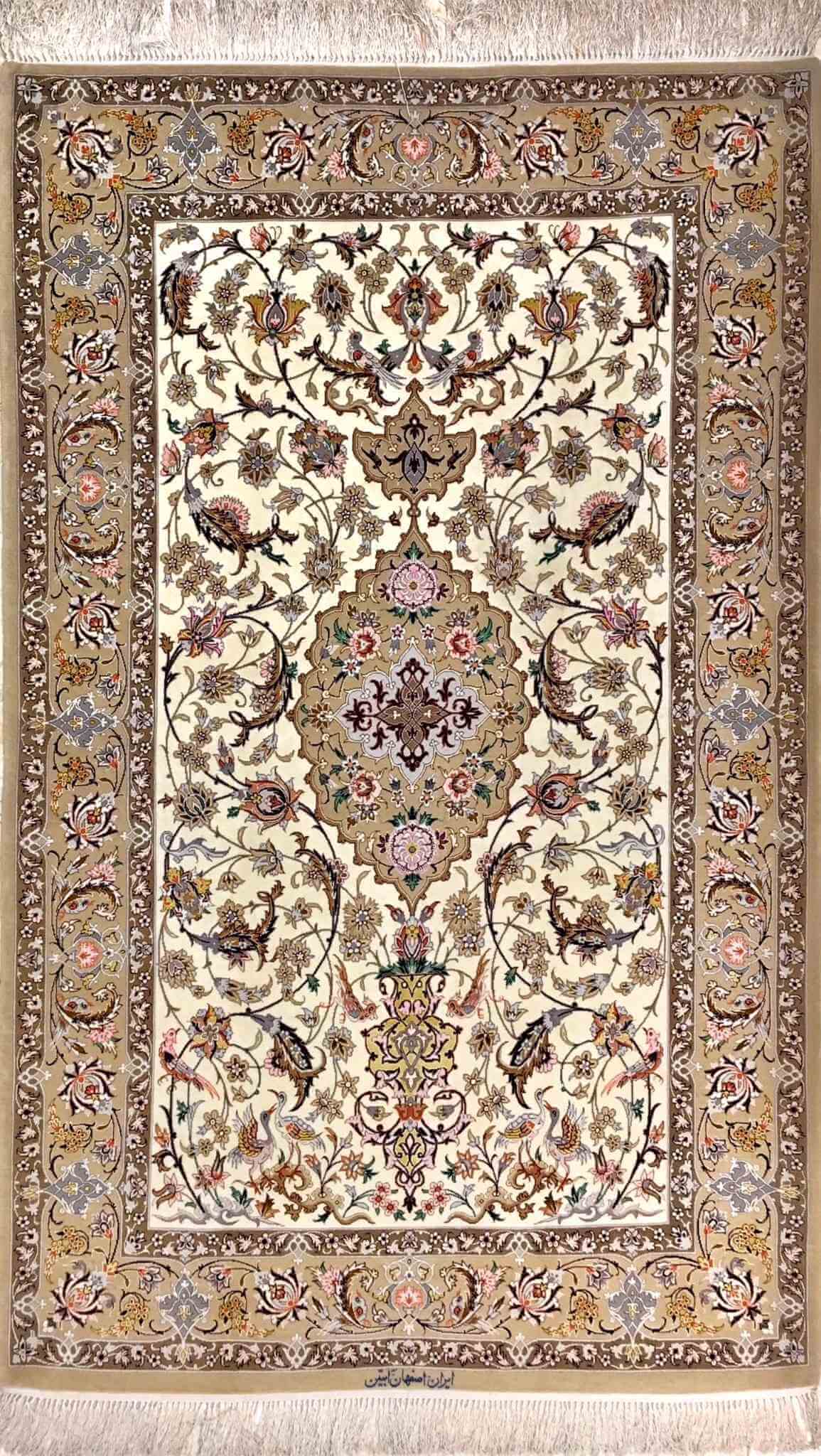 "Exquisite wool and silk Persian rug, hand-knotted in Isfahan, Iran. Size: 143 cm x 110 cm (4.7 feet x 3.6 feet). Features intricate Persian design with 810,000 knots per square meter. Luxurious home decor piece."