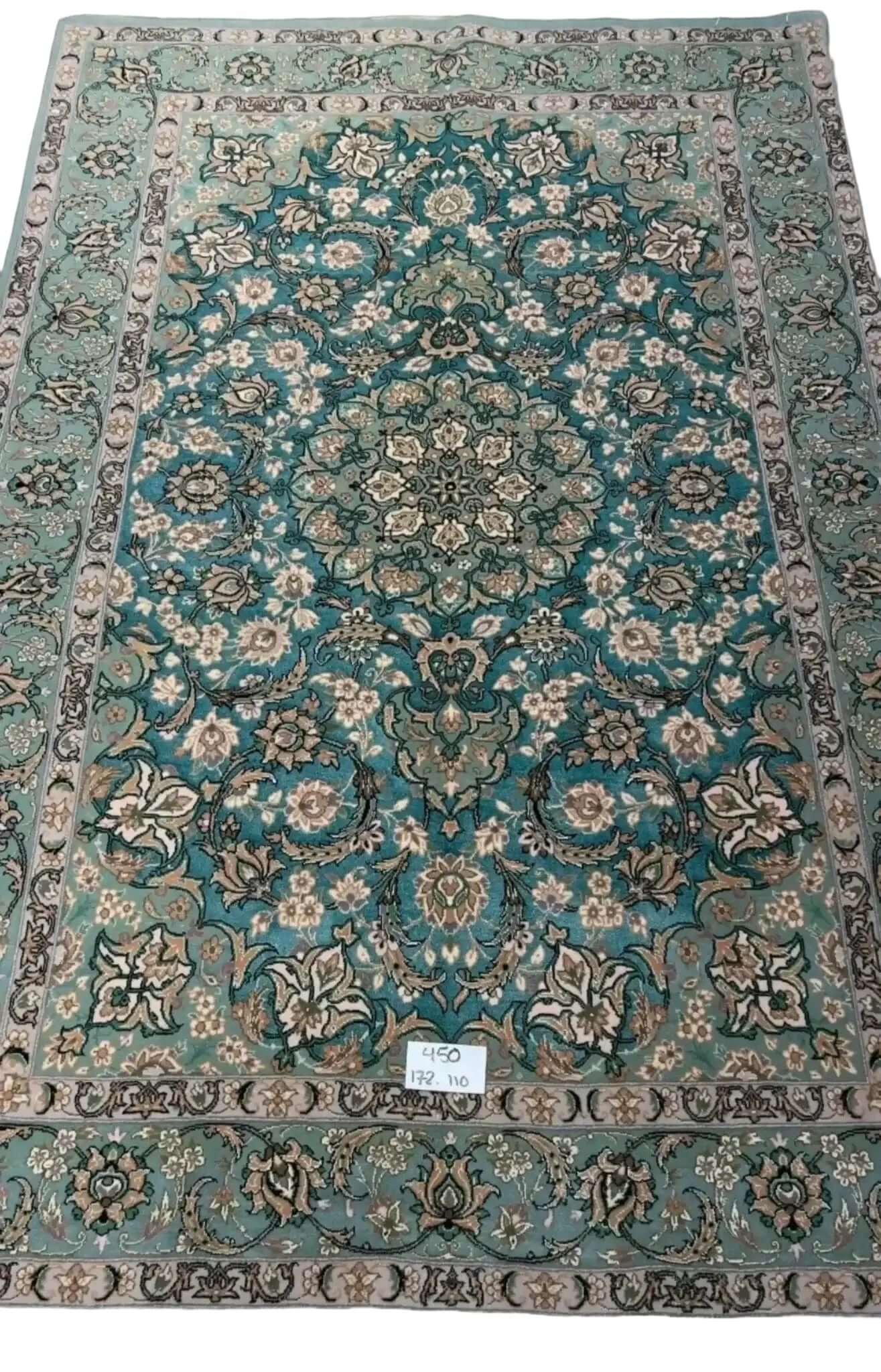 "Luxury Persian carpet from Iran featuring a delicate floral pattern and a high knot density of 810,000 knots per square meter."