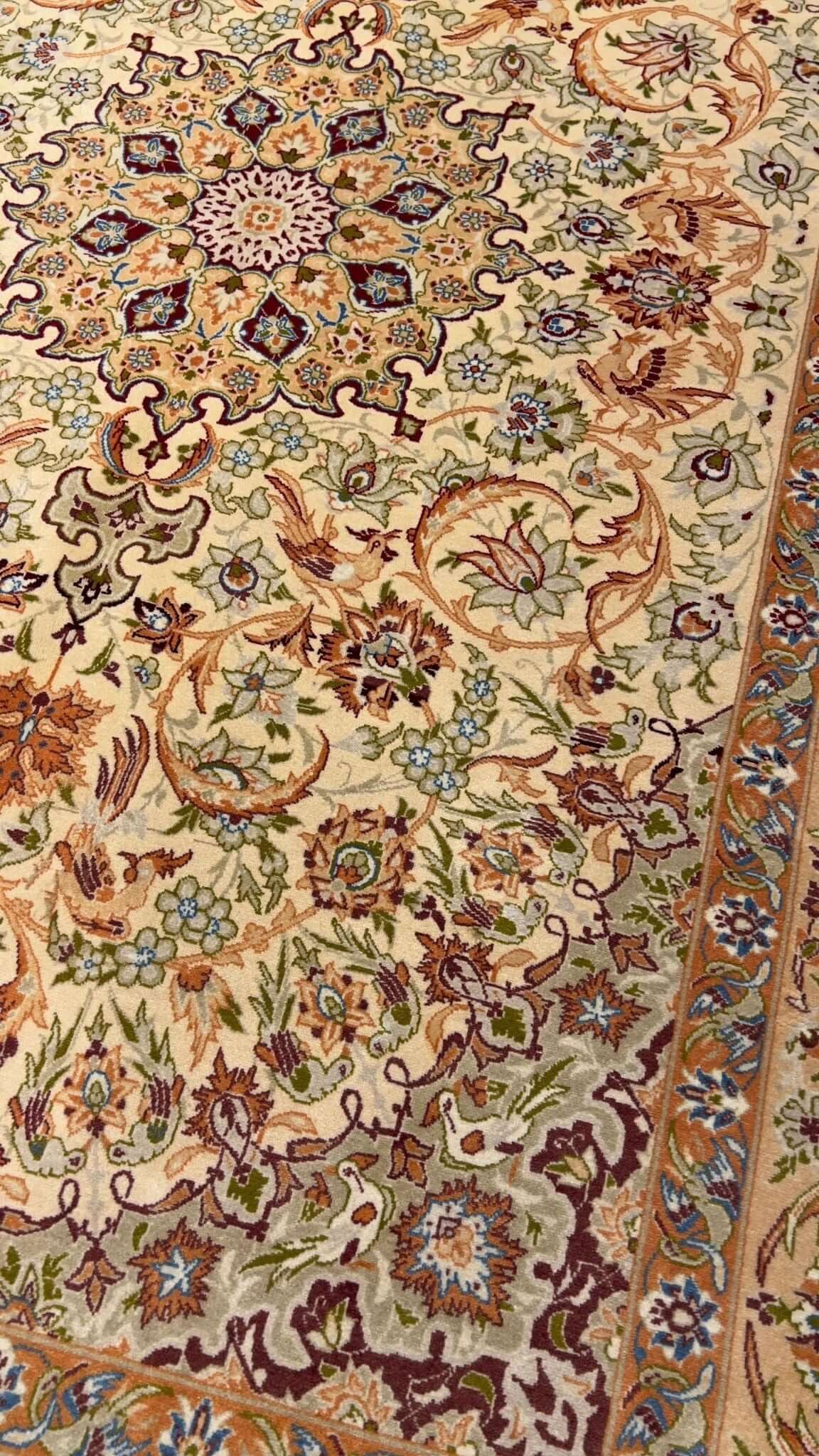 "Elegant Persian vintage rug with floral motifs and rich cultural significance."
