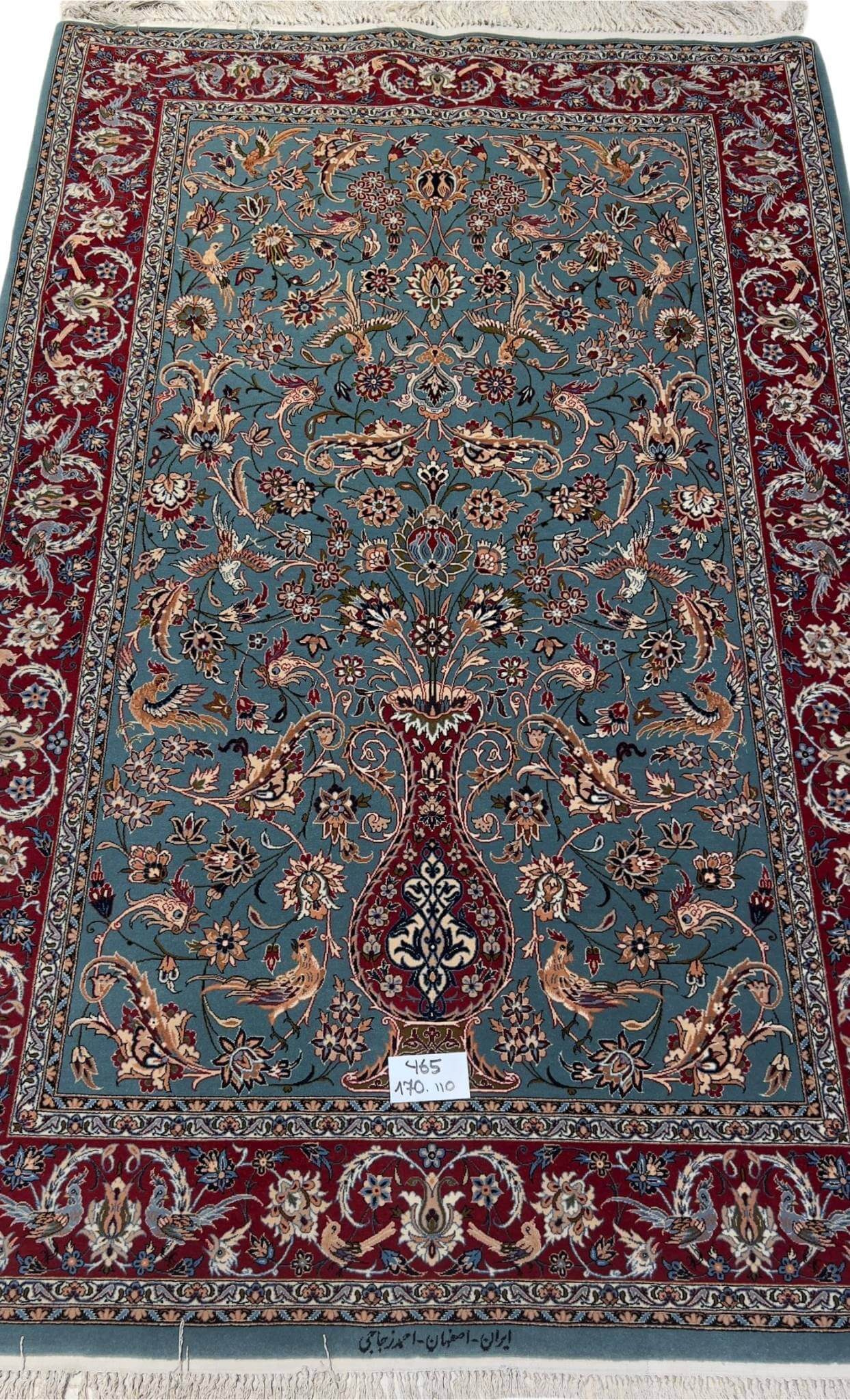 "Hand-knotted light blue Persian rug by Master Zojajie, 170x110 cm, crafted in Isfahan with silk warp and wool-silk blend pile."