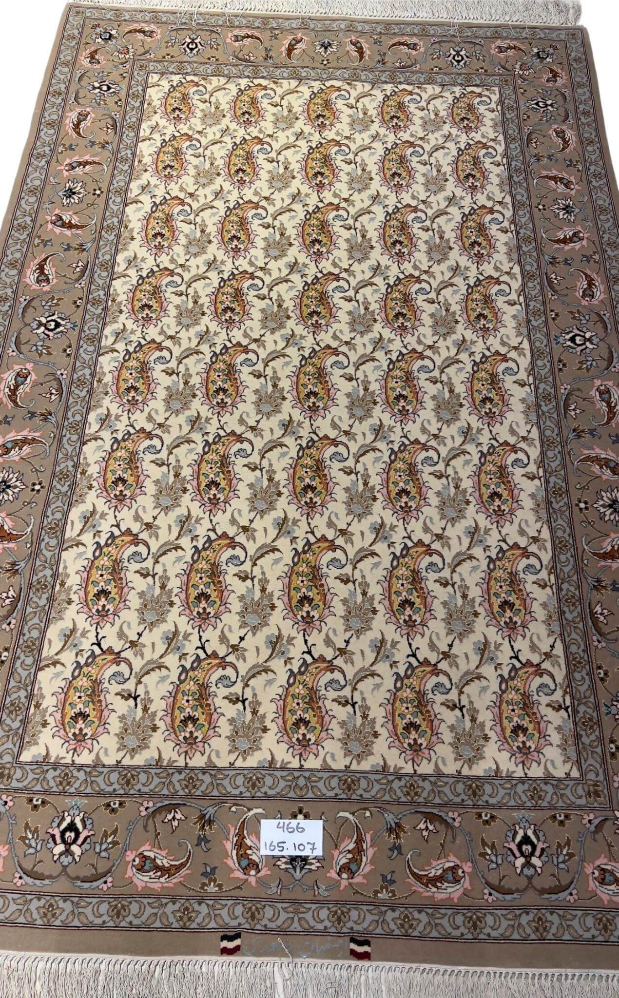 Authentic Persian Isfahan rug with intricate paisley patterns.
