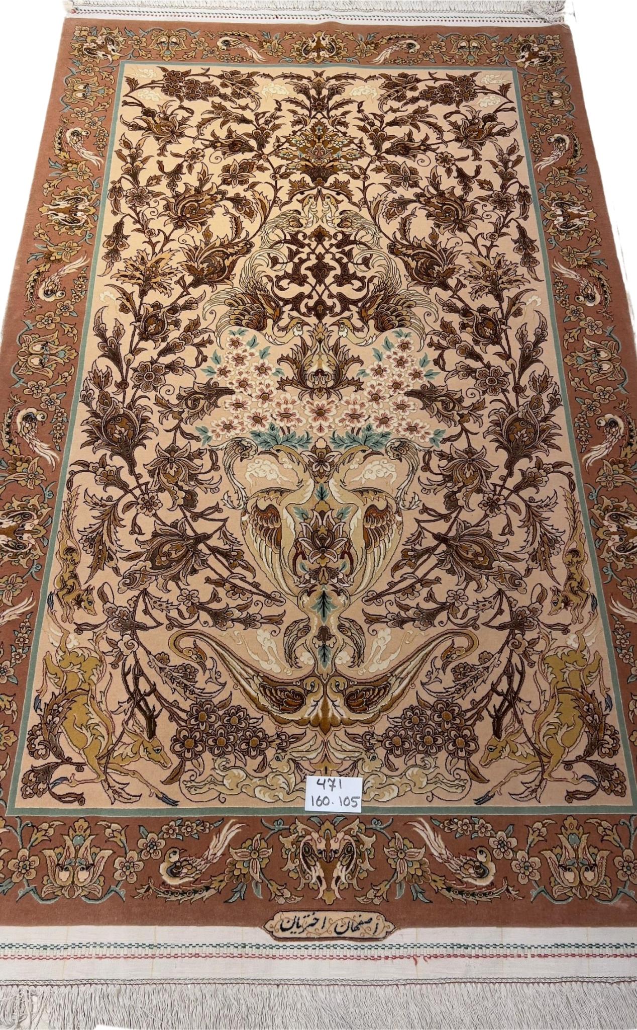 Persian Isfahan rug by Akhtarian with floral motifs.
