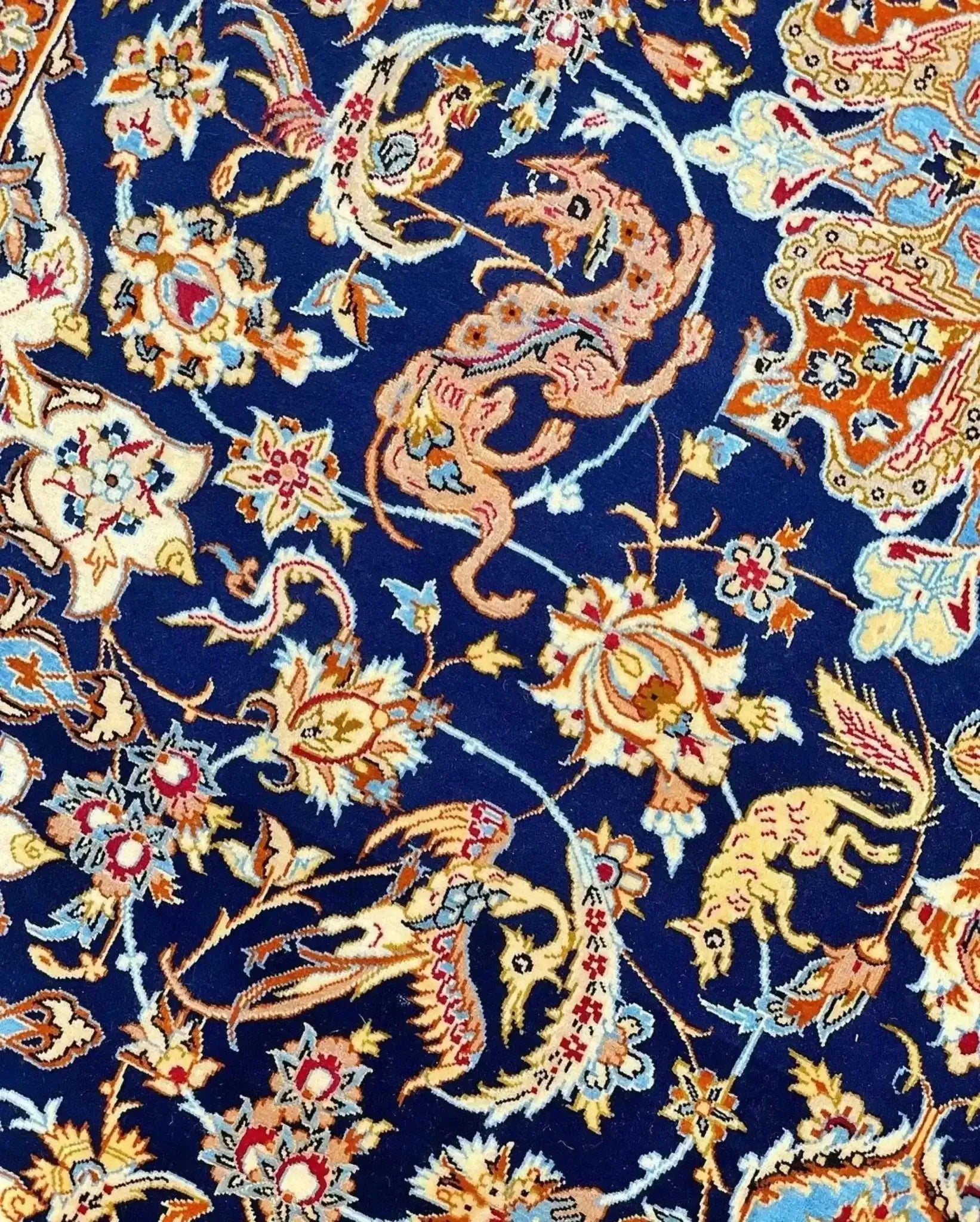 Persian rug with intricate designs, showcasing the craftsmanship of traditional Isfahan weavers.

