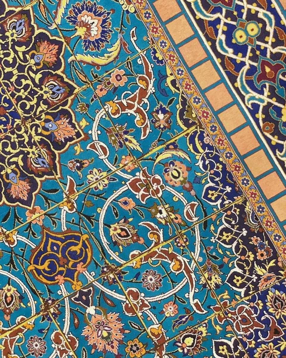 "Handmade Isfahan silk rug 220x150 cm by Grandmaster Haghighie featuring intricate Persian designs."