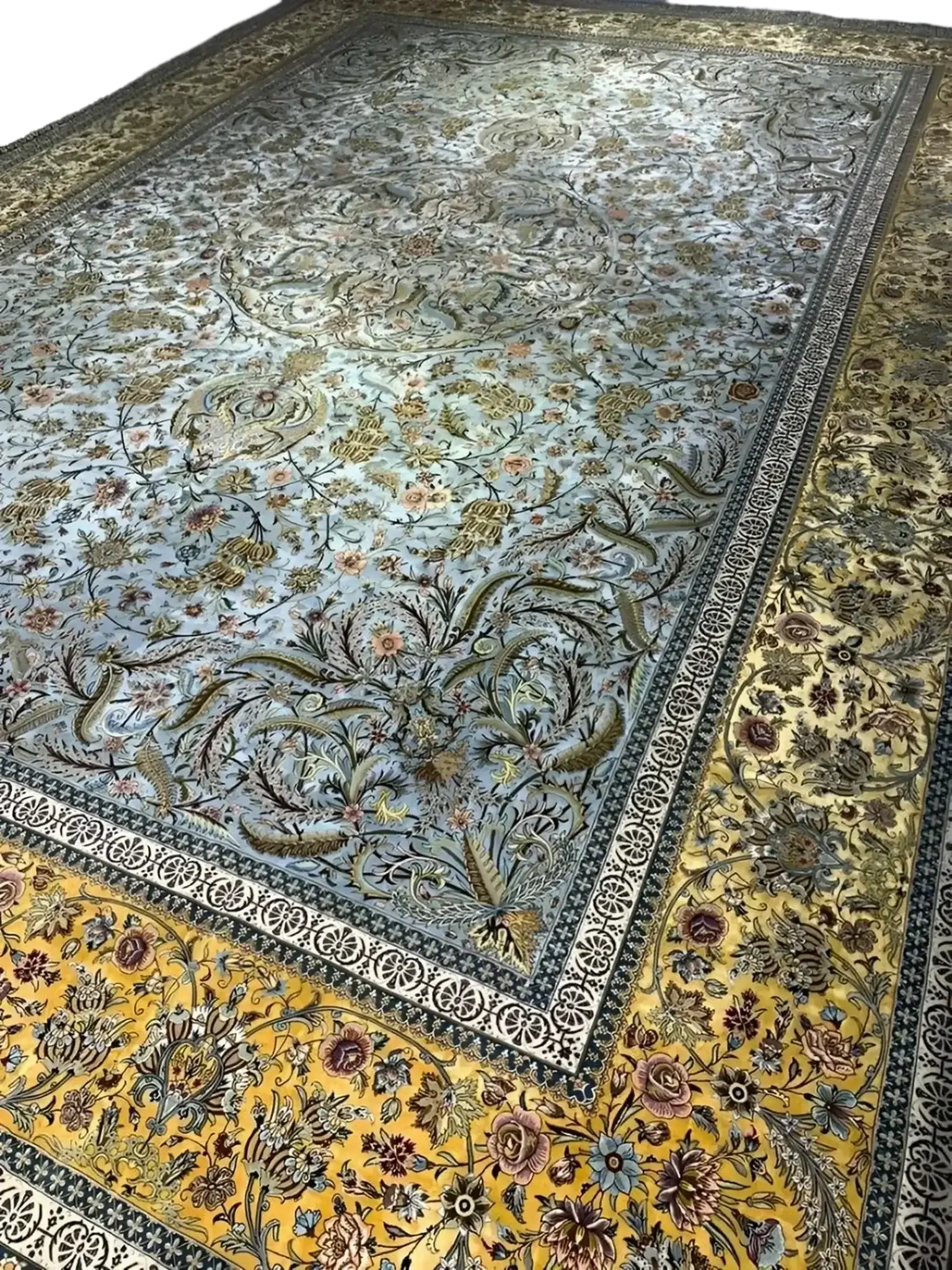 "Intricately woven Persian rug featuring detailed floral patterns and vibrant colors, showcasing exquisite craftsmanship from Isfahan, Iran."