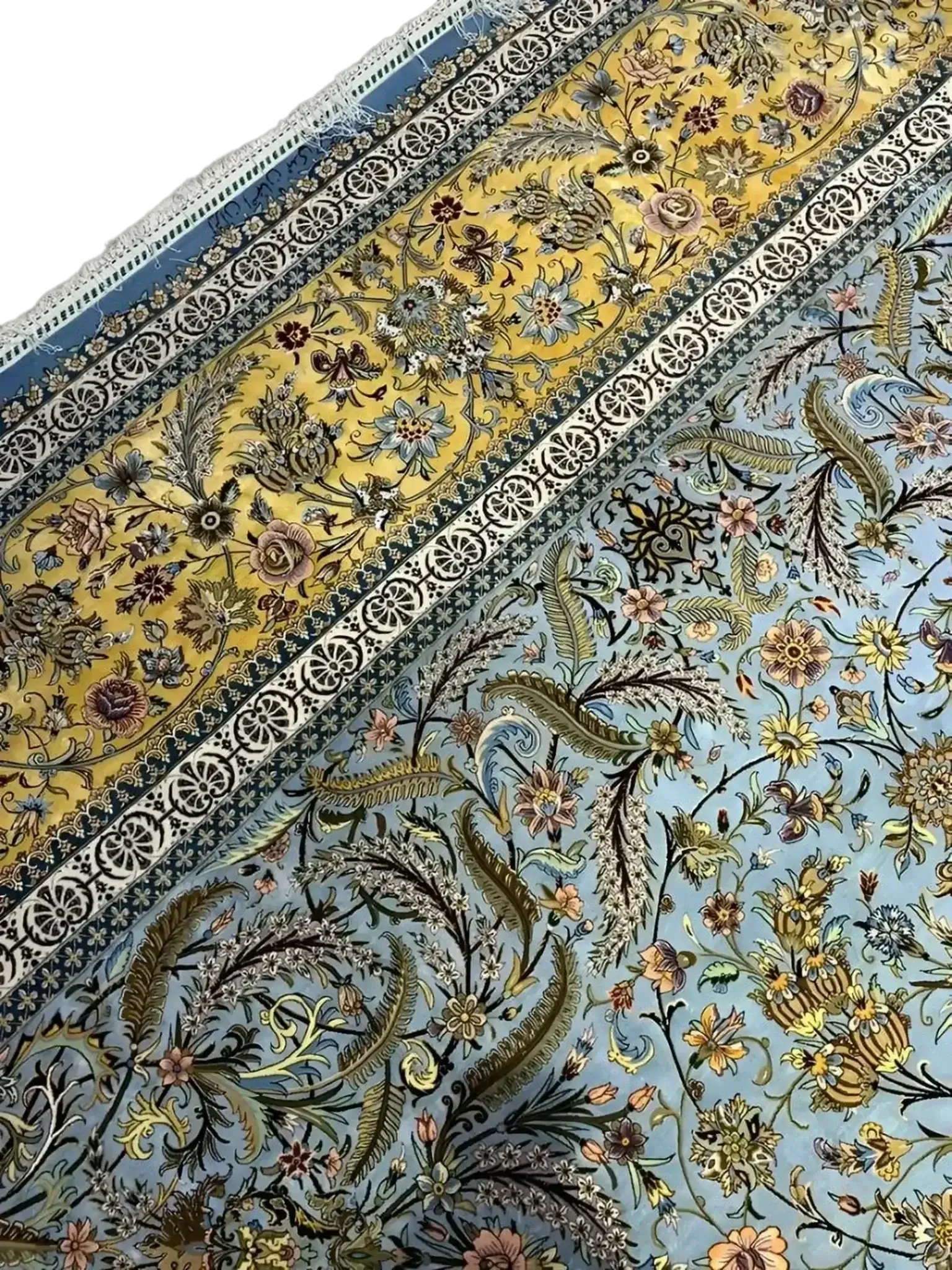 "Masterfully crafted Persian carpet in vibrant blue and gold tones, exemplifying the intricate weaving techniques of Isfahan, Iran."