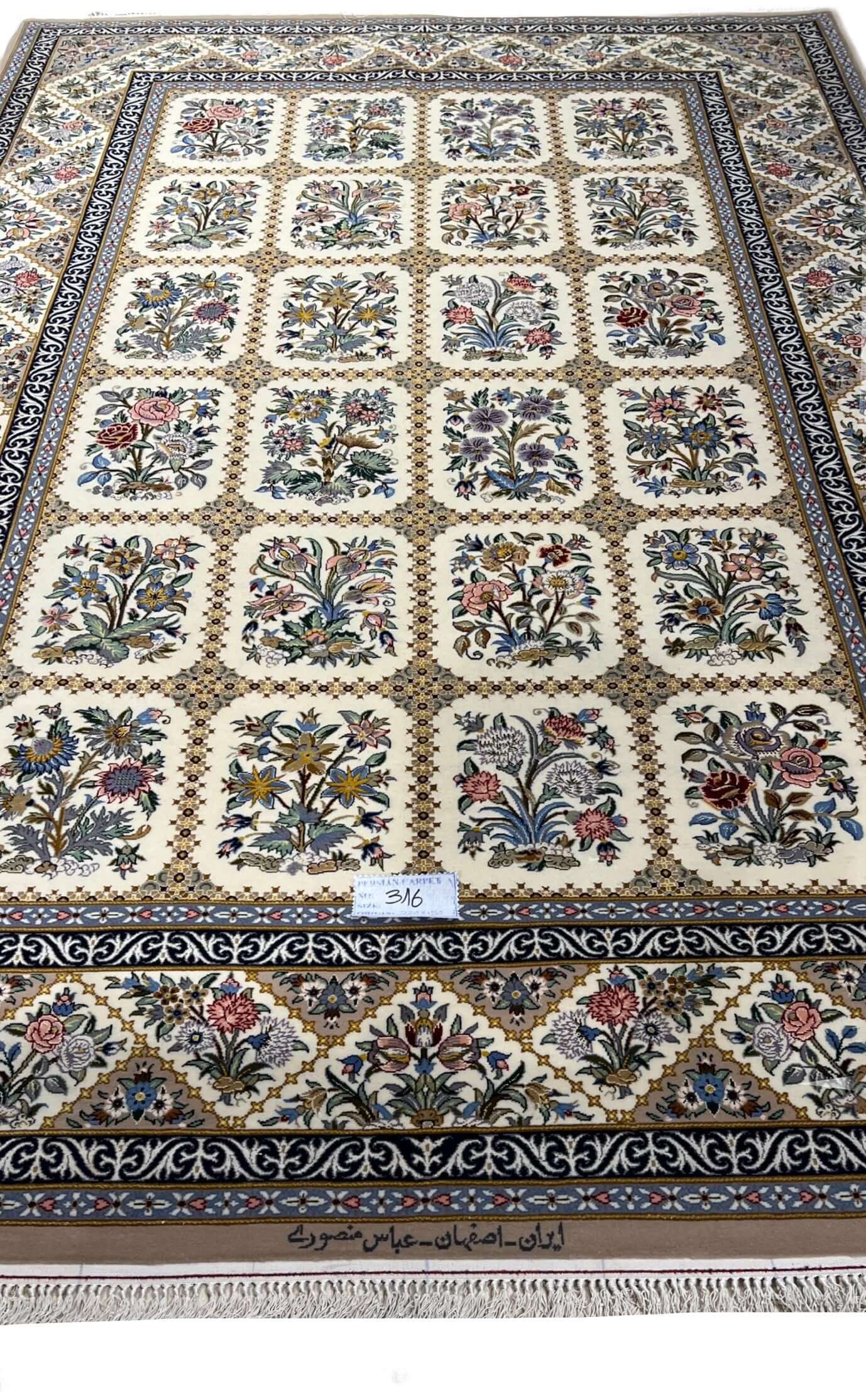 "Luxury hand-knotted Isfahan Persian rug with a floral grid design, crafted with 1,210,000 knots per square meter."