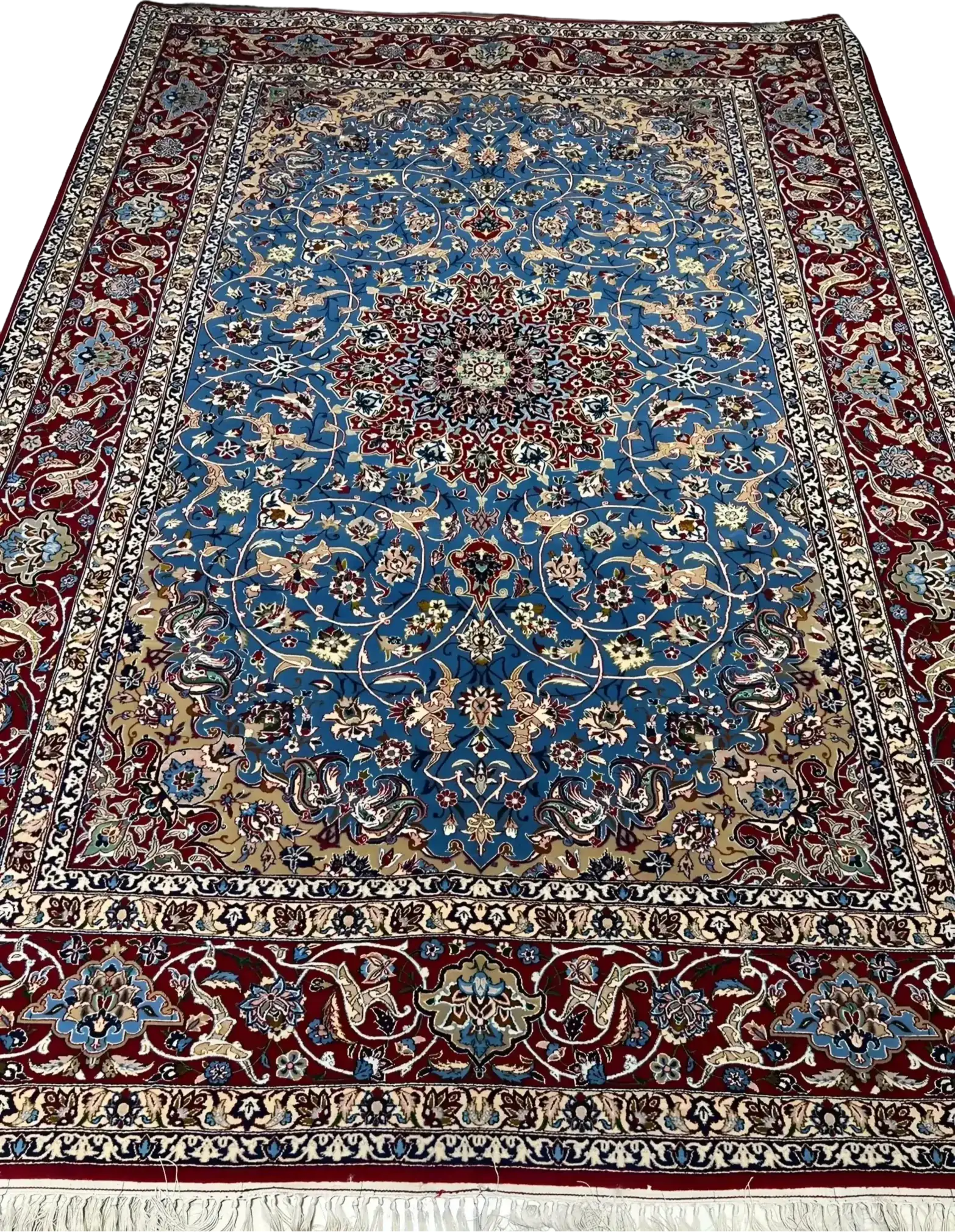 Detail shot of the hand-knotted craftsmanship of the Authentic Isfahan Rug with a focus on the blue and red design