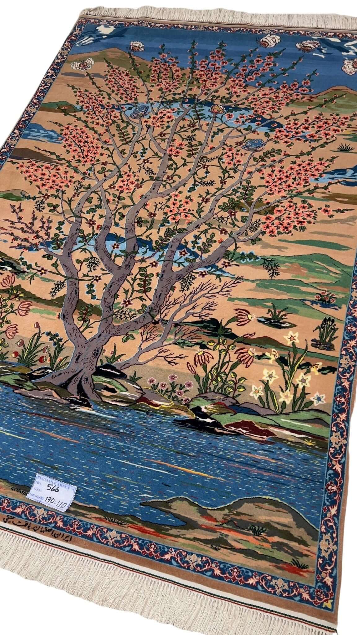 "Unique Isfahan rug with intricate knot density, handwoven by Master Haghighie."
