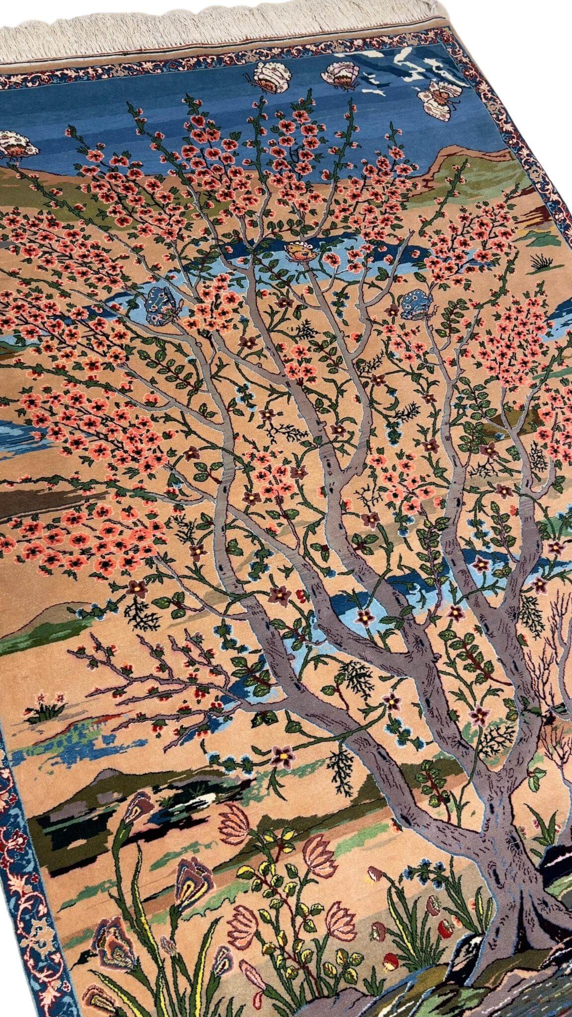 "170x110 cm Persian rug showcasing picturesque nature and fine Persian craftsmanship."
