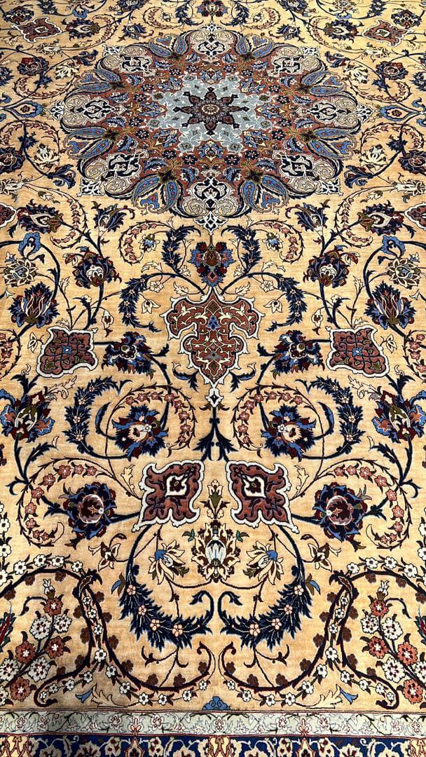 Handcrafted Silk Rufugaran Rug featuring a prominent medallion centerpiece