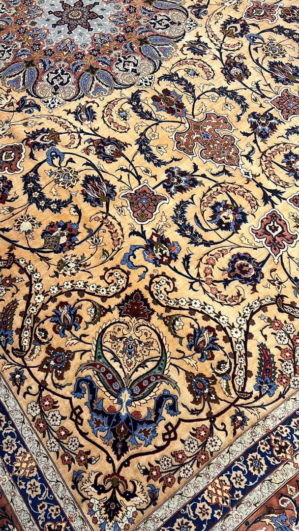 Angle view of the Handcrafted Silk Rufugaran Rug showcasing the medallion and border artistry