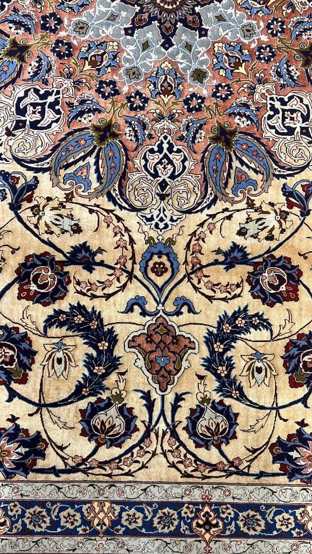 Handcrafted Rufugaran Silk Rug with a pattern of blue, red, and beige hues