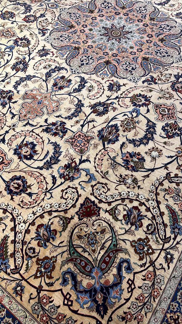 Close-up of the floral patterns on the Handcrafted Silk Rufugaran Rug