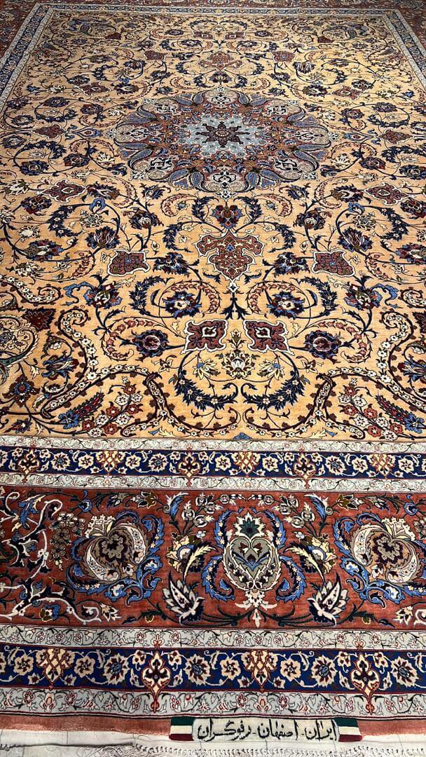 Handcrafted Rufugaran Silk Rug with a distinctive large medallion and ornate border detailing